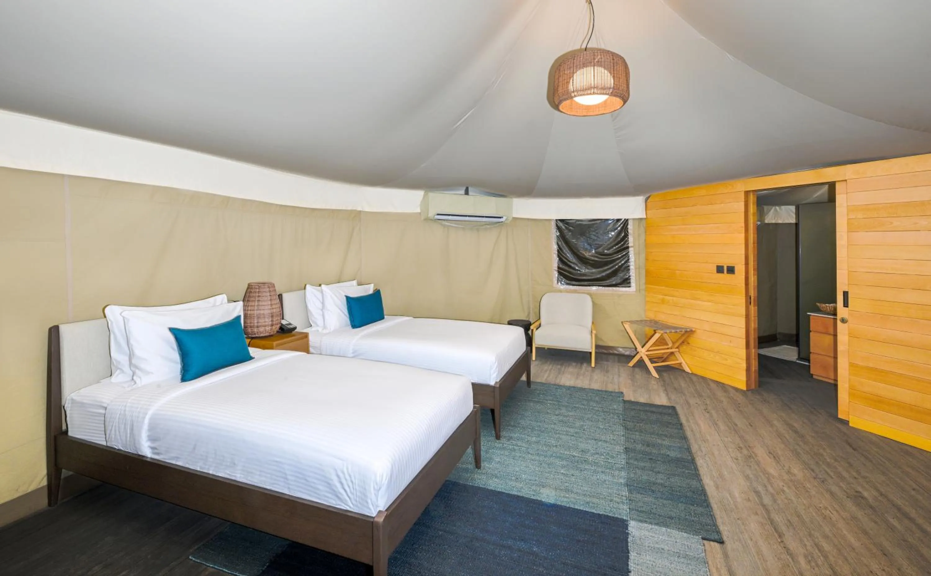 Bed in Kingfisher Retreat by Sharjah Collection