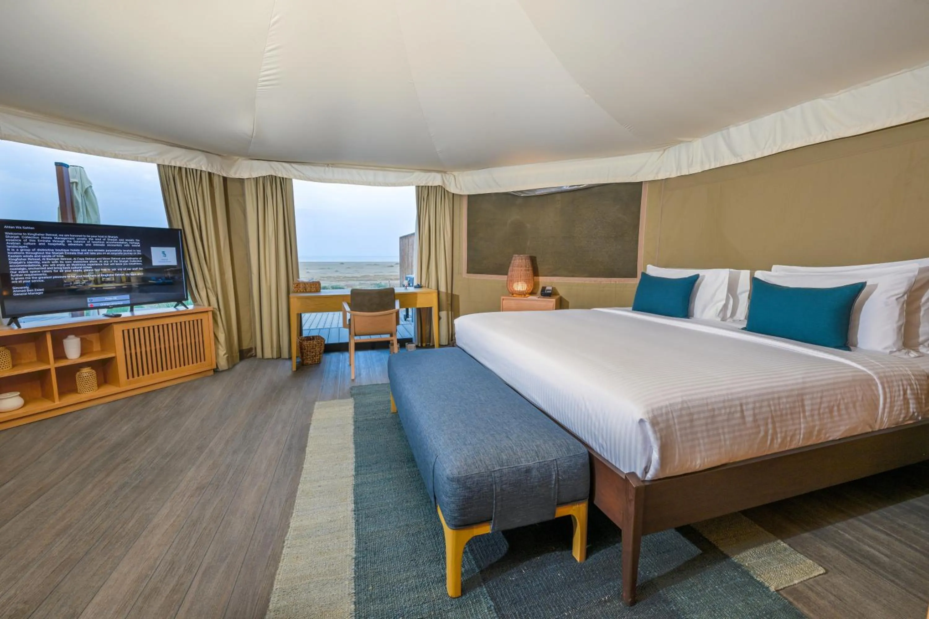 TV and multimedia, Bed in Kingfisher Retreat by Sharjah Collection