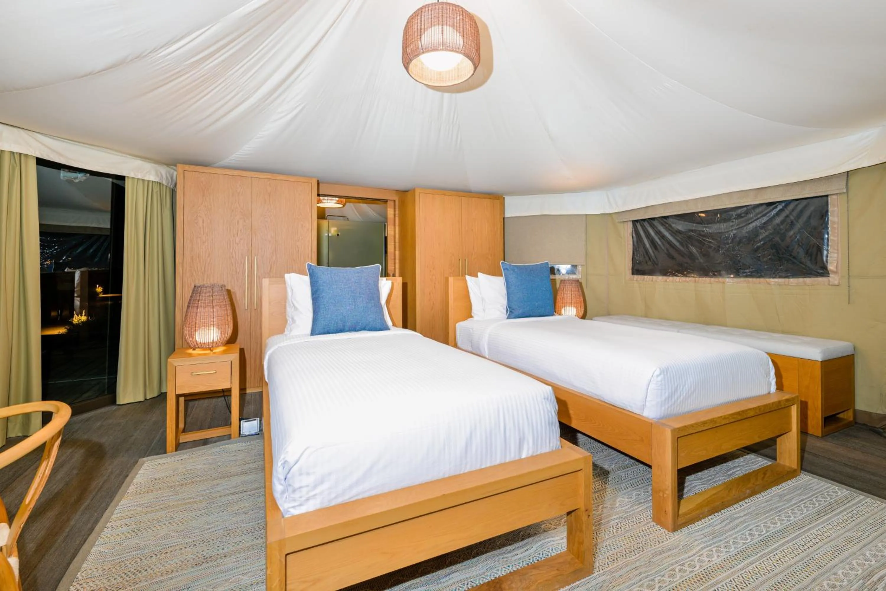 Bed in Kingfisher Retreat by Sharjah Collection