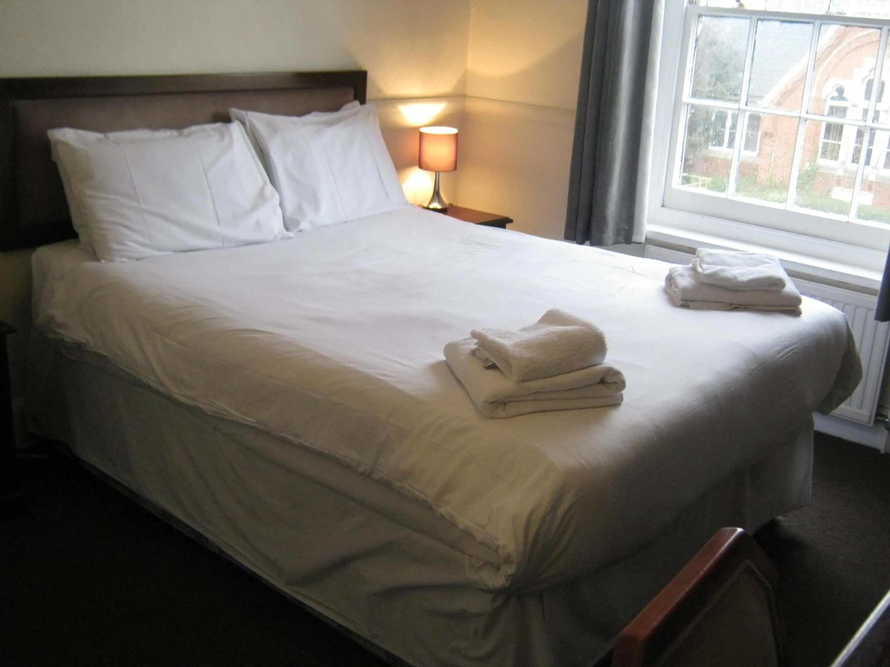 Bed in Rose and Crown Hotel