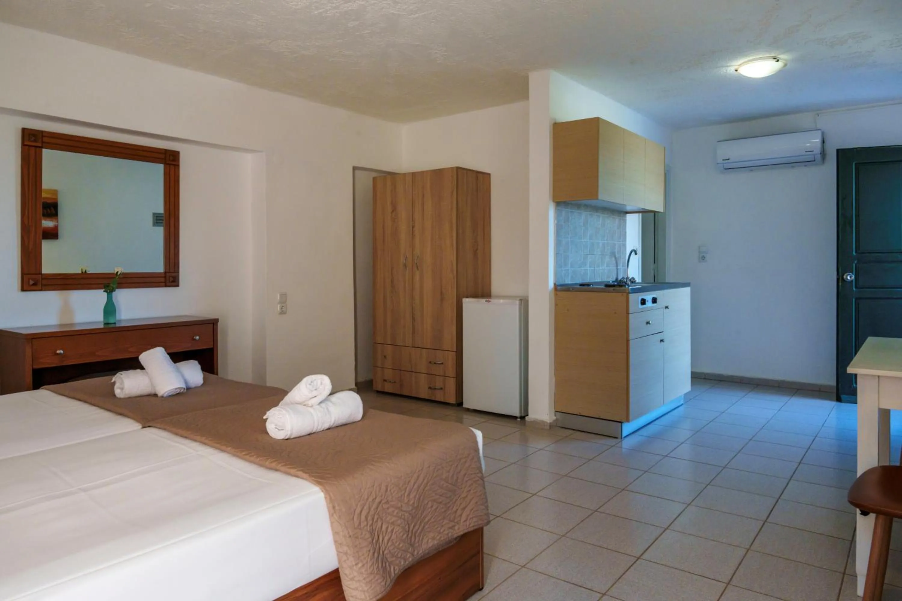 Kitchen or kitchenette, Bed in Kri-Kri Village Holiday Apts by Estia