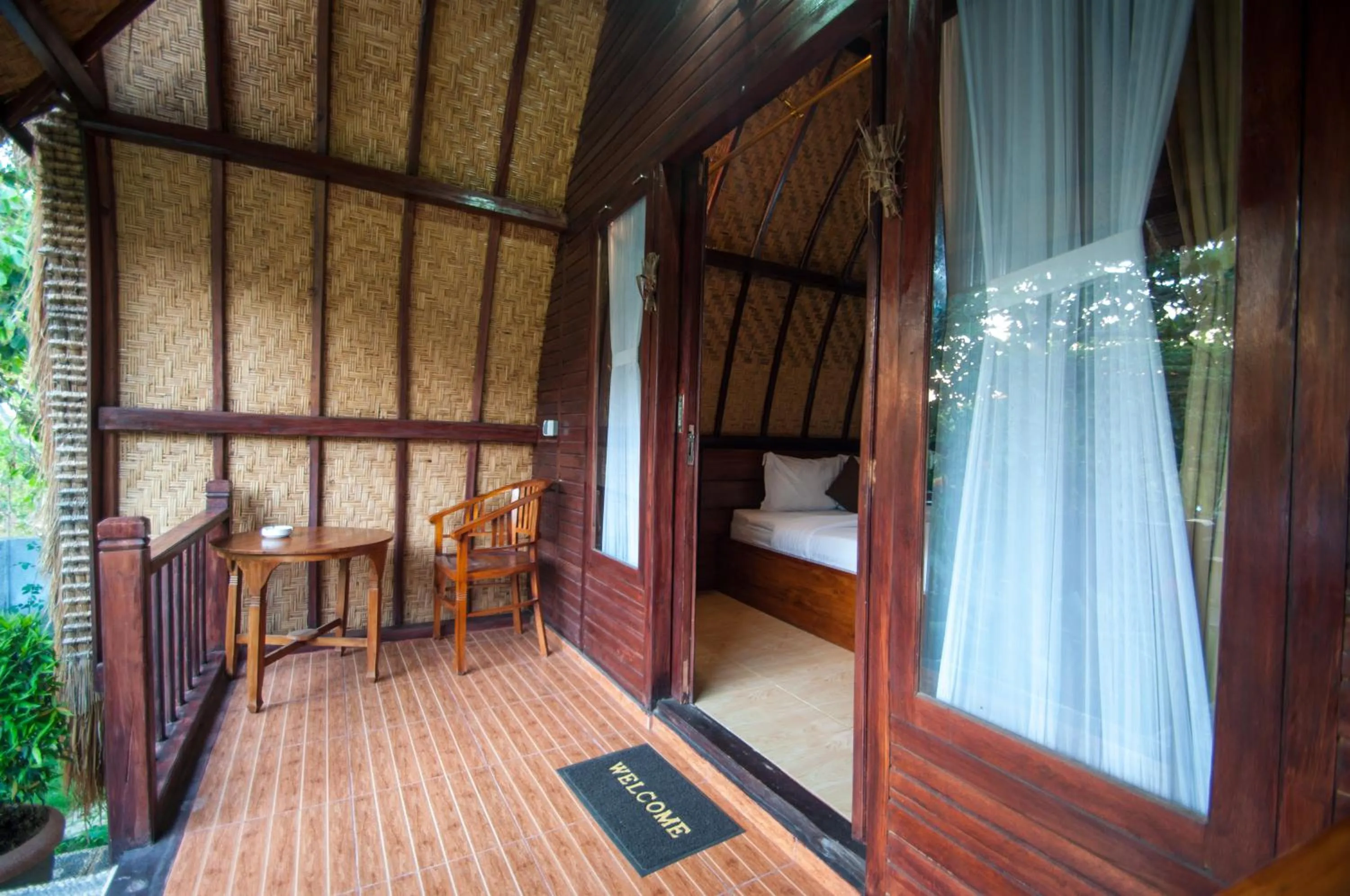 Balcony/Terrace, Bed in Jona Bungalow