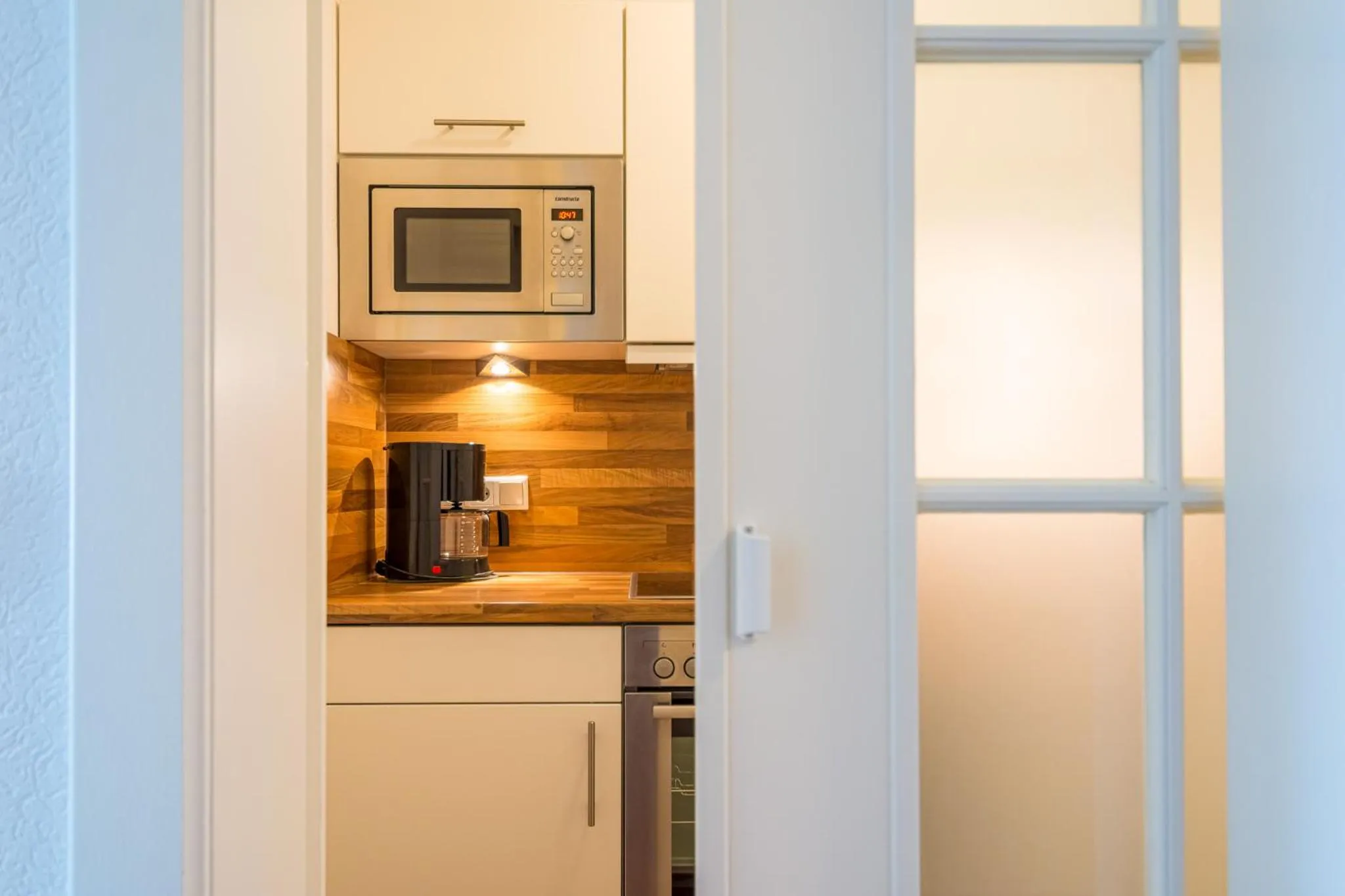 Kitchen or kitchenette in Inselhotel Arfsten