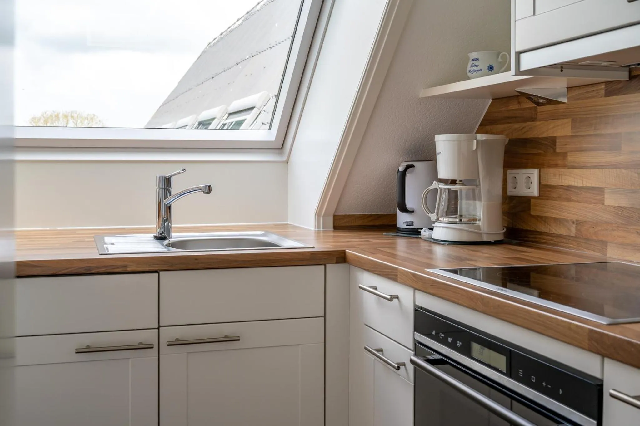 Kitchen or kitchenette in Inselhotel Arfsten