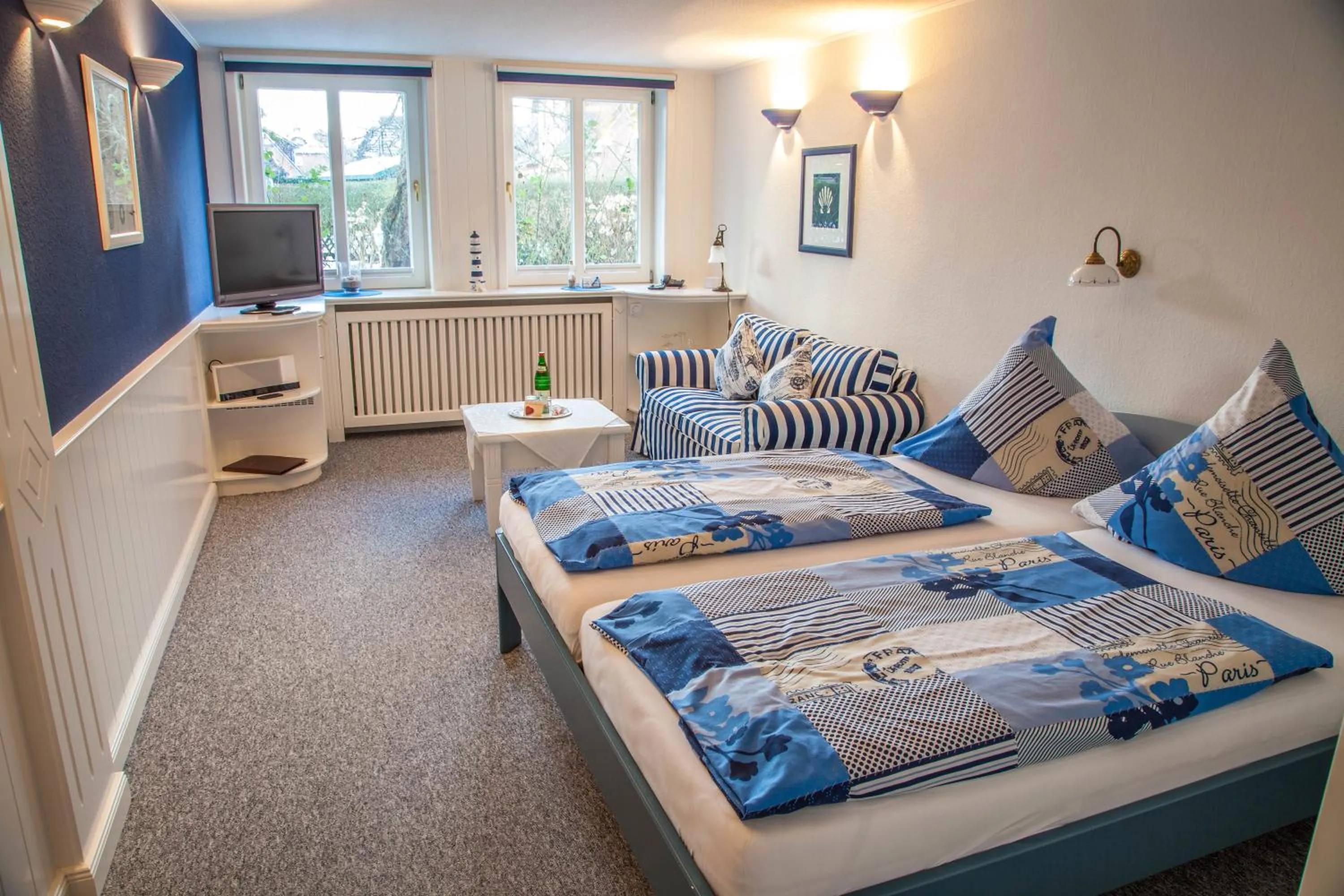 Photo of the whole room, Bed in Inselhotel Arfsten