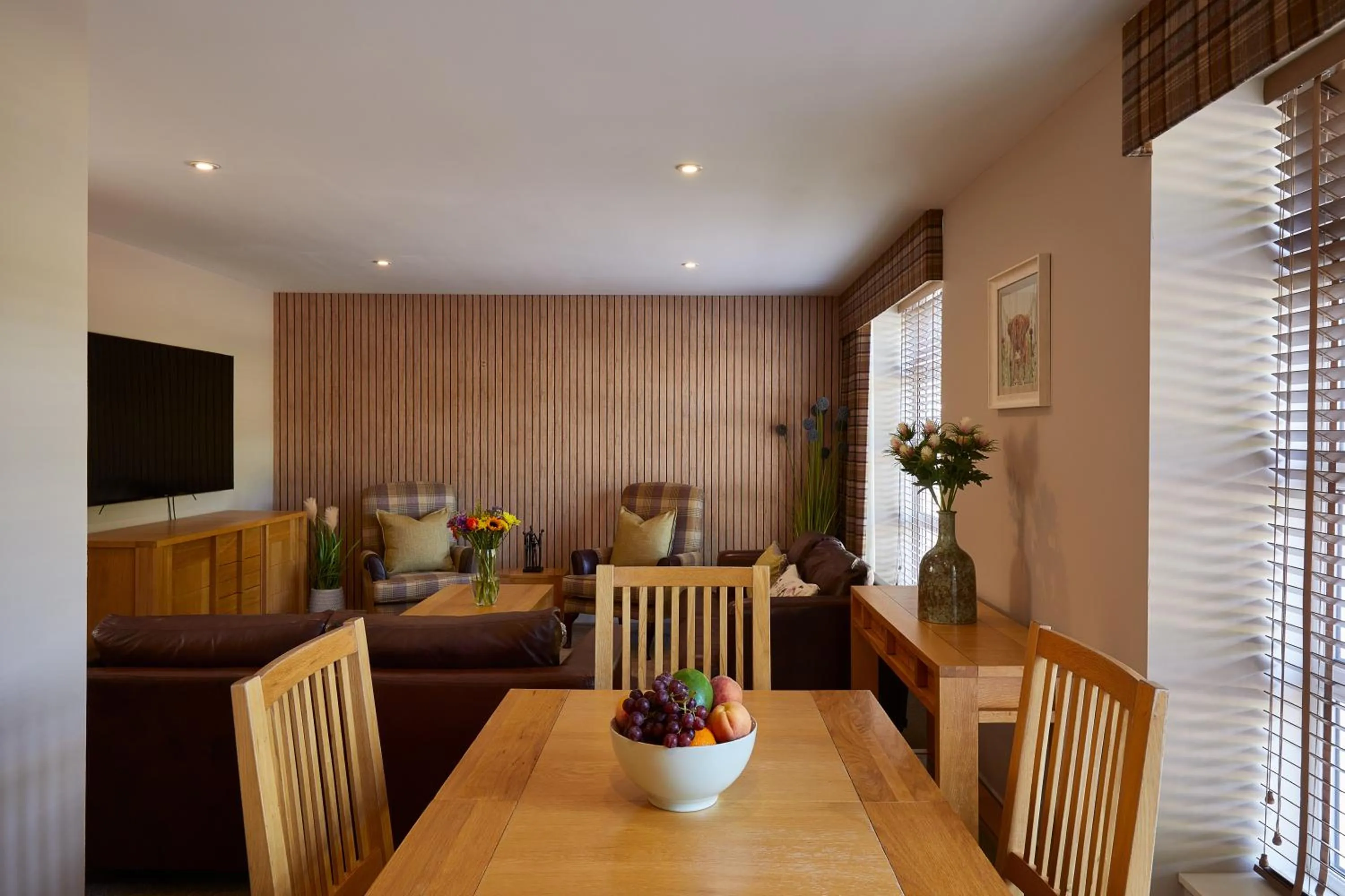 Dining area in Macdonald Woodland Lodges at Macdonald Aviemore Resort
