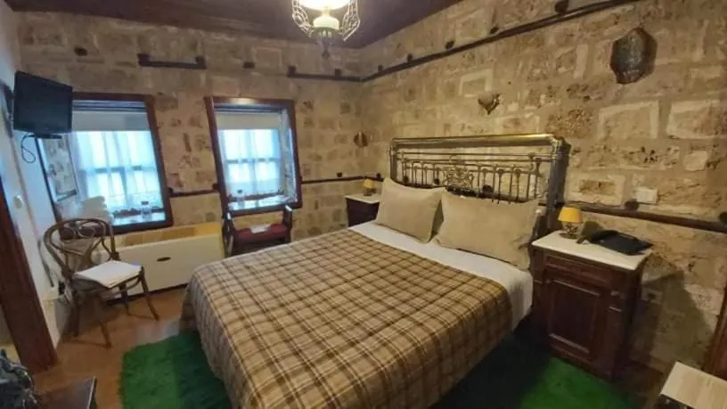 Bed in Hagiati Guesthouse - Edessa Cozy Mountain Retreat