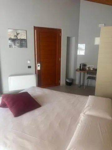 Bed in Albavillage Rooms & Camping