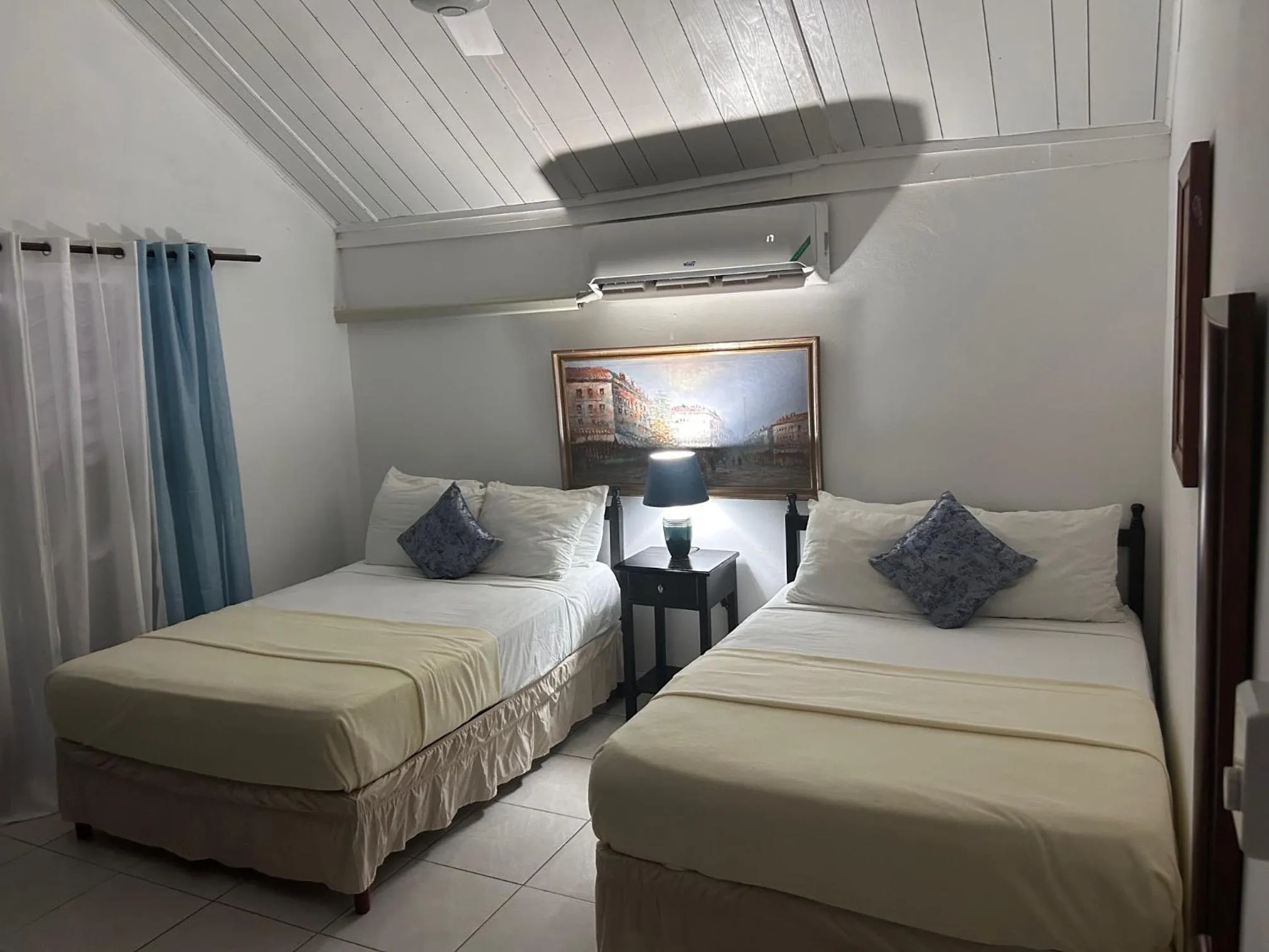 Bed in Firefly Beach Cottages