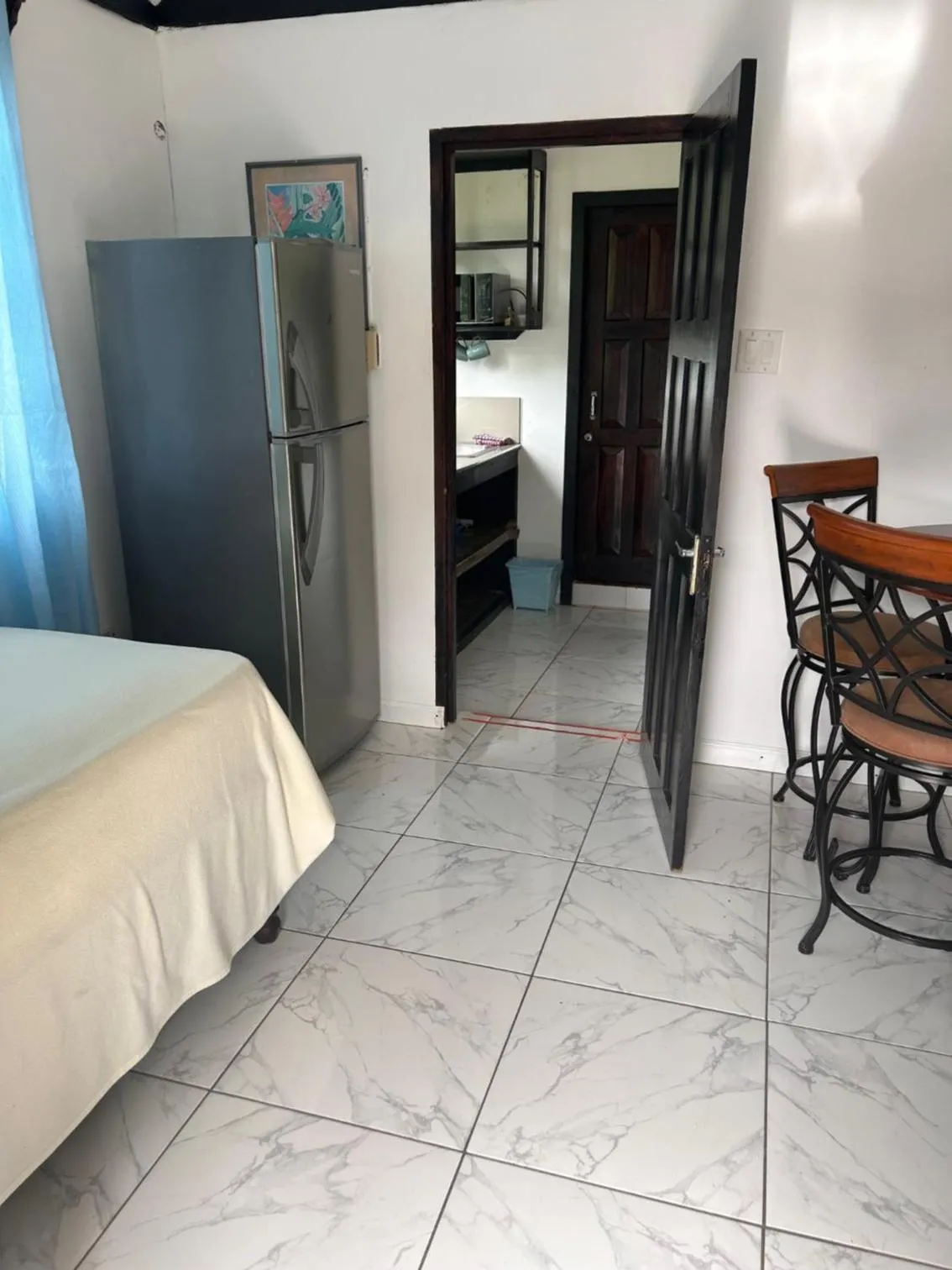 Bed in Firefly Beach Cottages