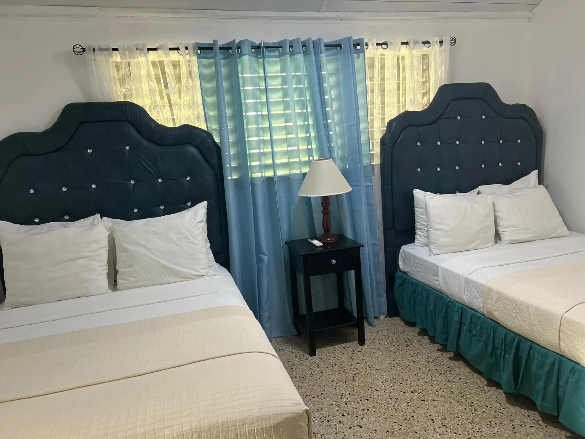 Bed in Firefly Beach Cottages