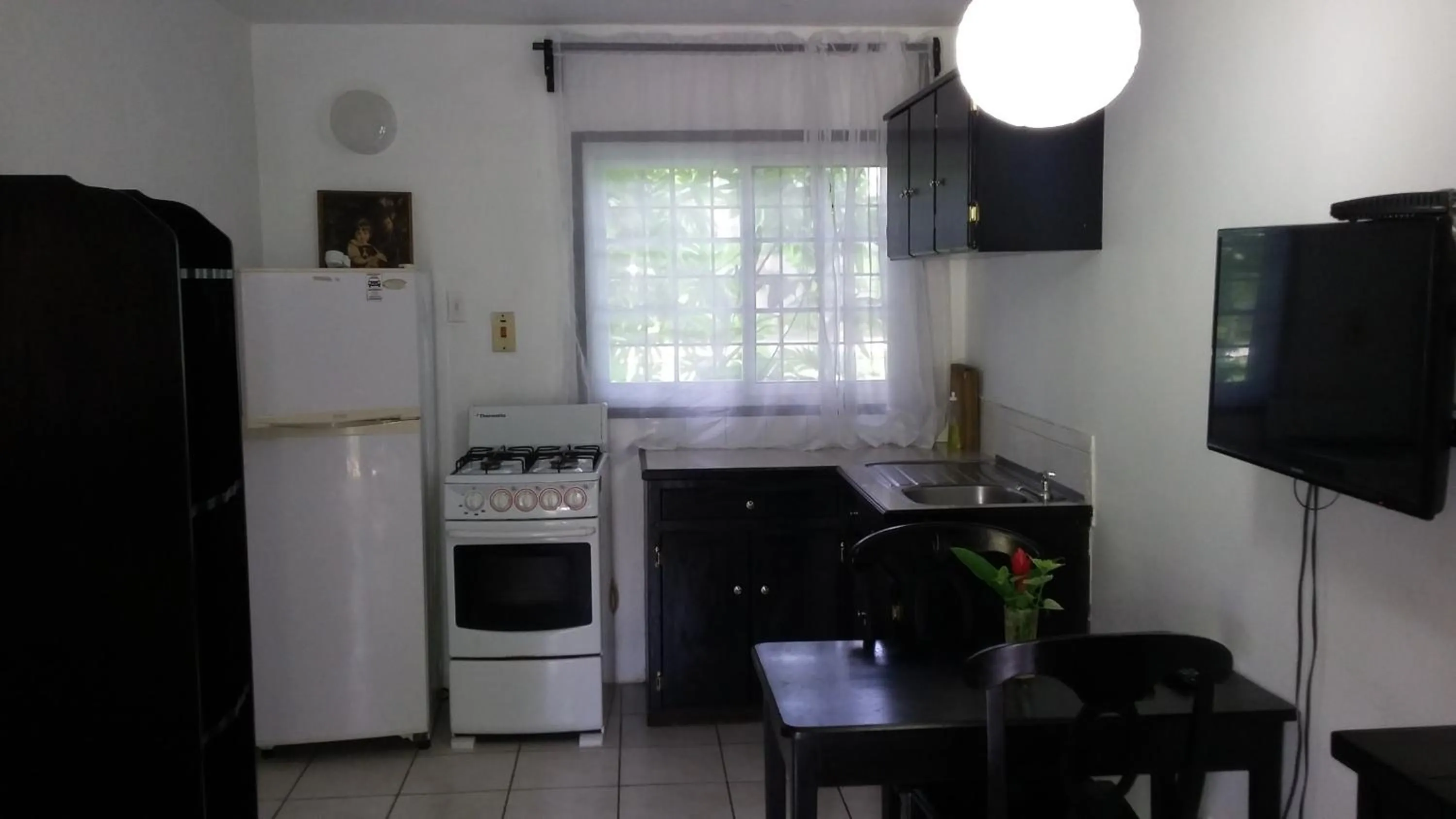 Communal kitchen in Firefly Beach Cottages