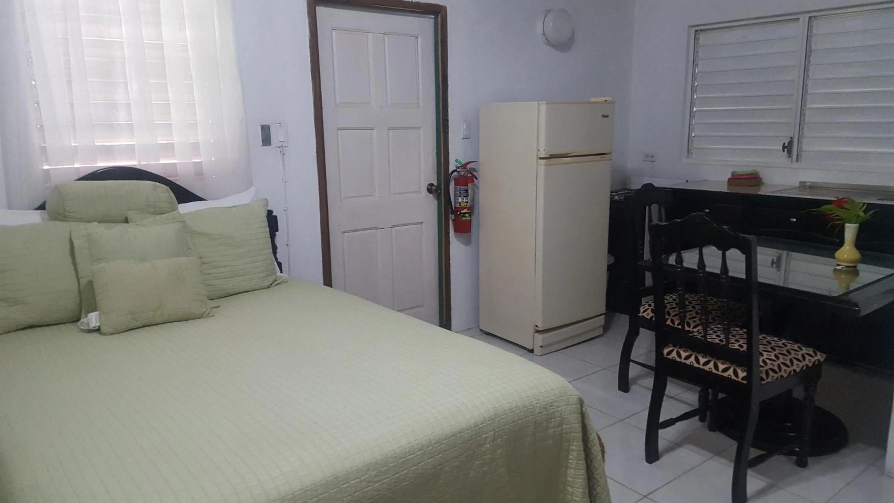 Bed in Firefly Beach Cottages