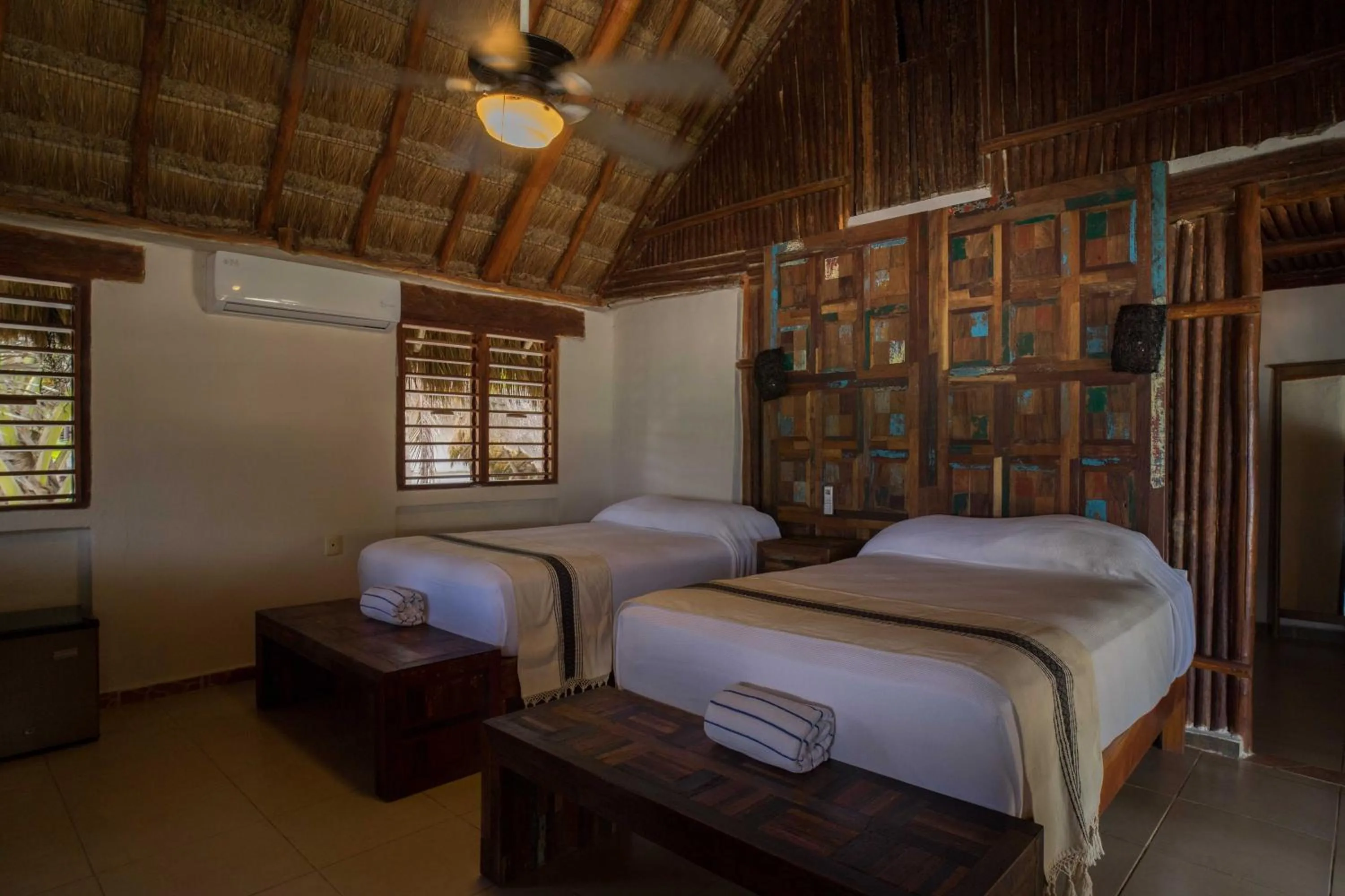 Bed in BT Live Tulum located at the party zone