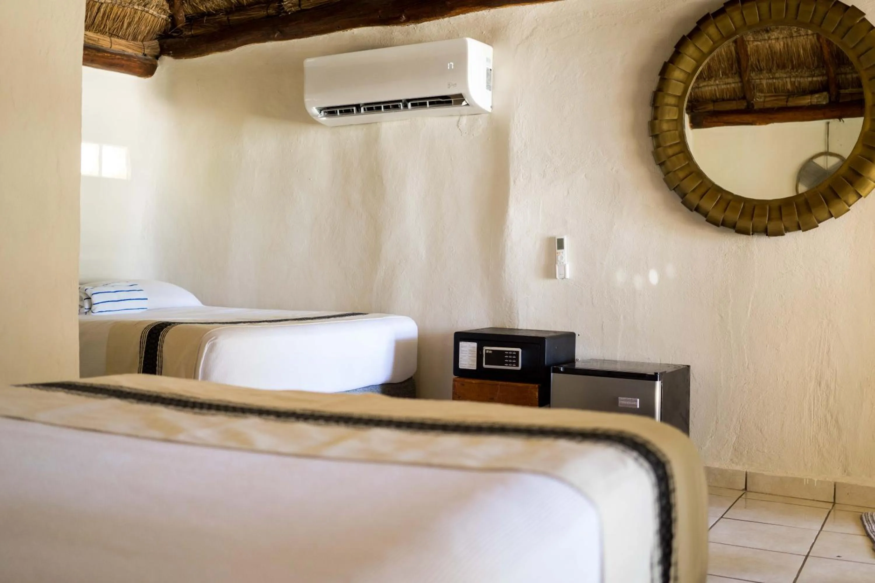 Bed in BT Live Tulum located at the party zone