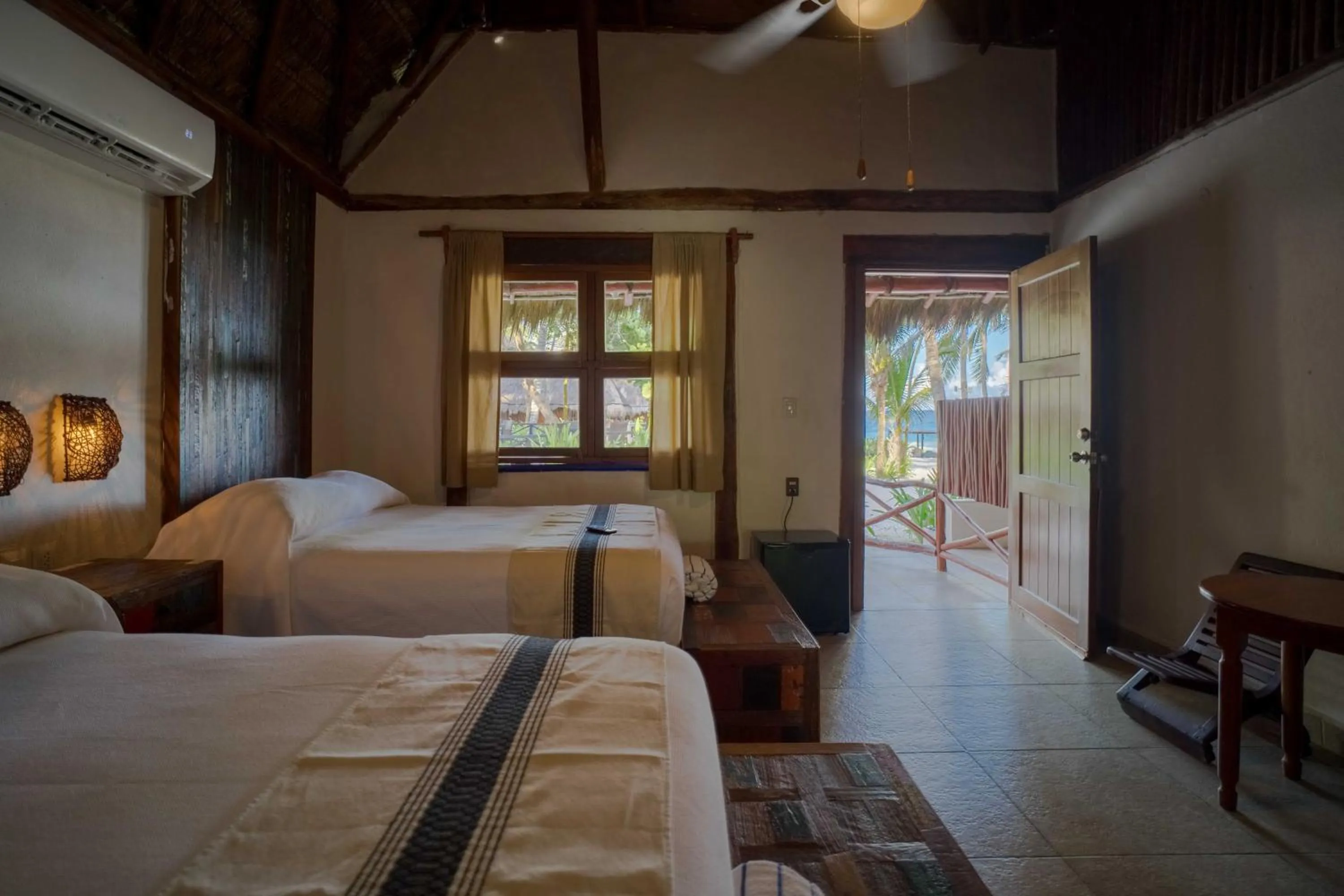 Bed in BT Live Tulum located at the party zone