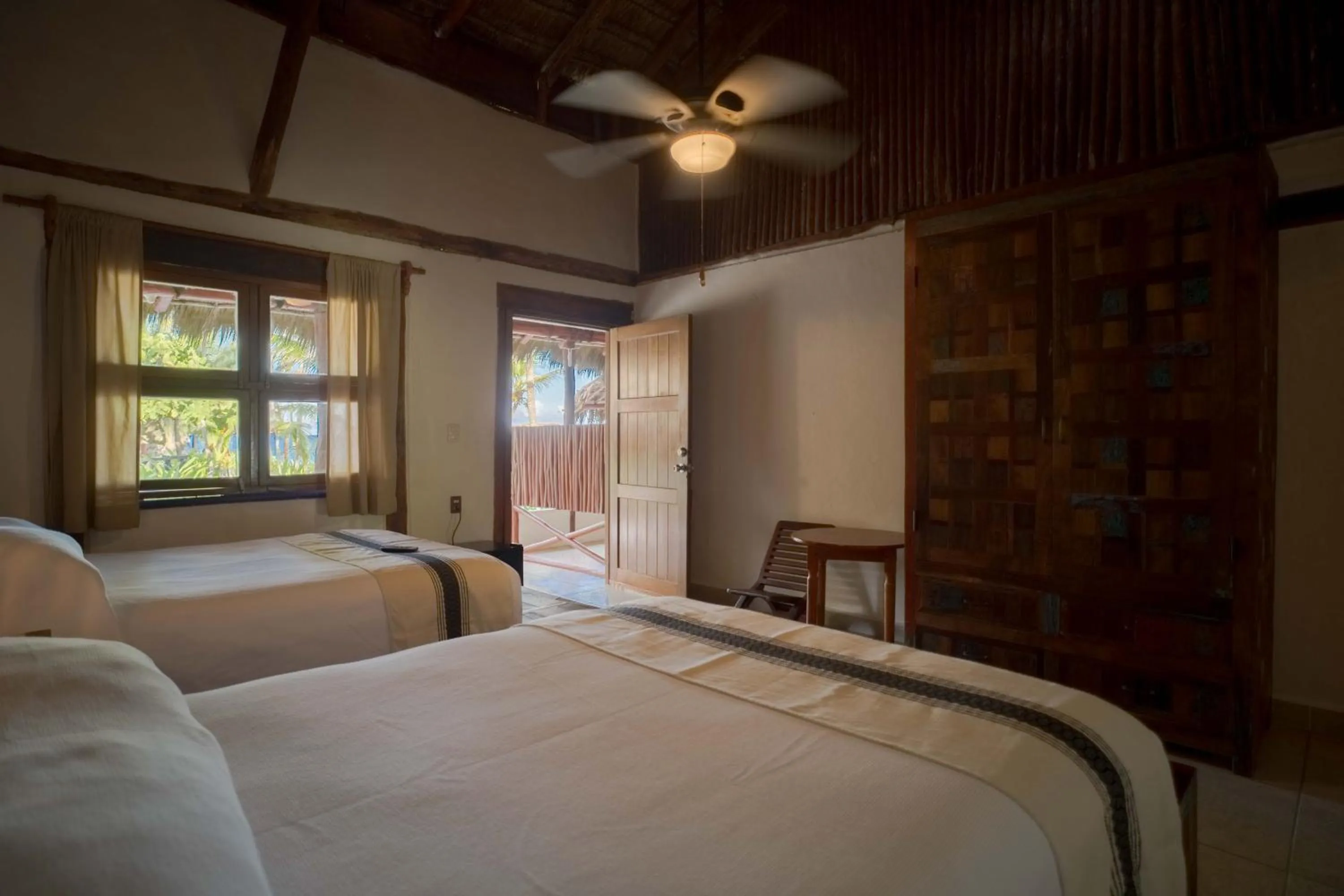 Bed in BT Live Tulum located at the party zone