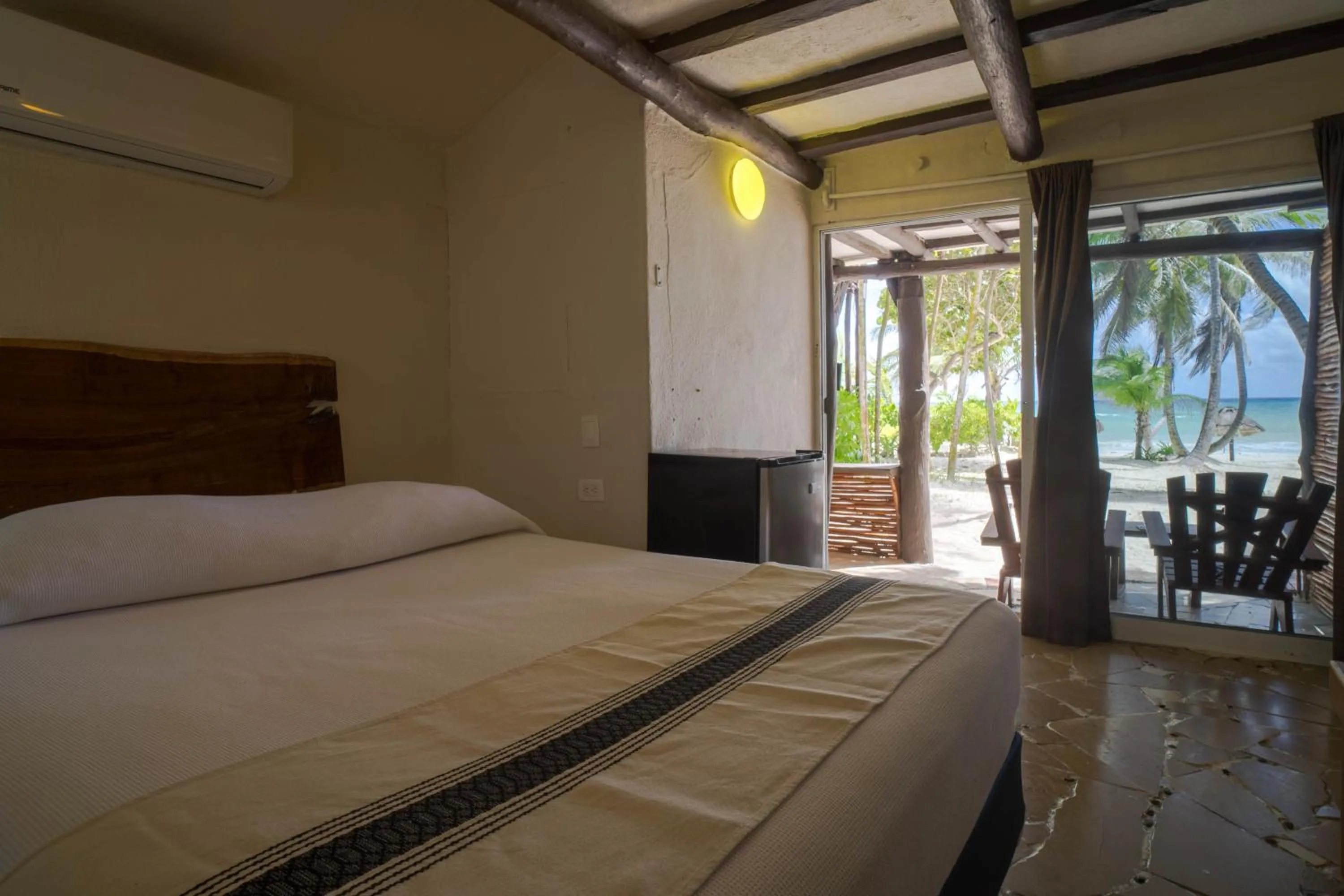 Bed in BT Live Tulum located at the party zone