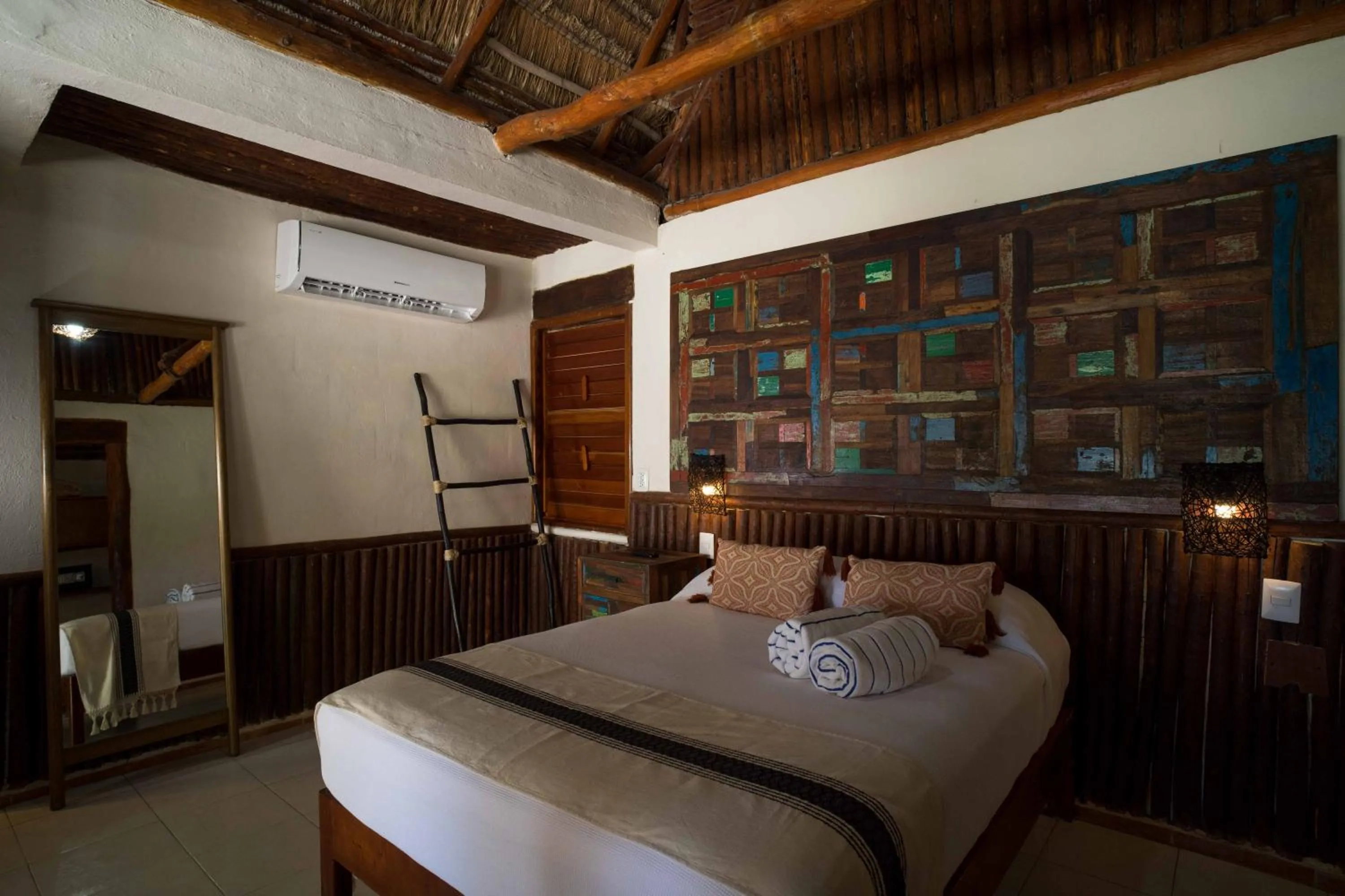 Bed in BT Live Tulum located at the party zone