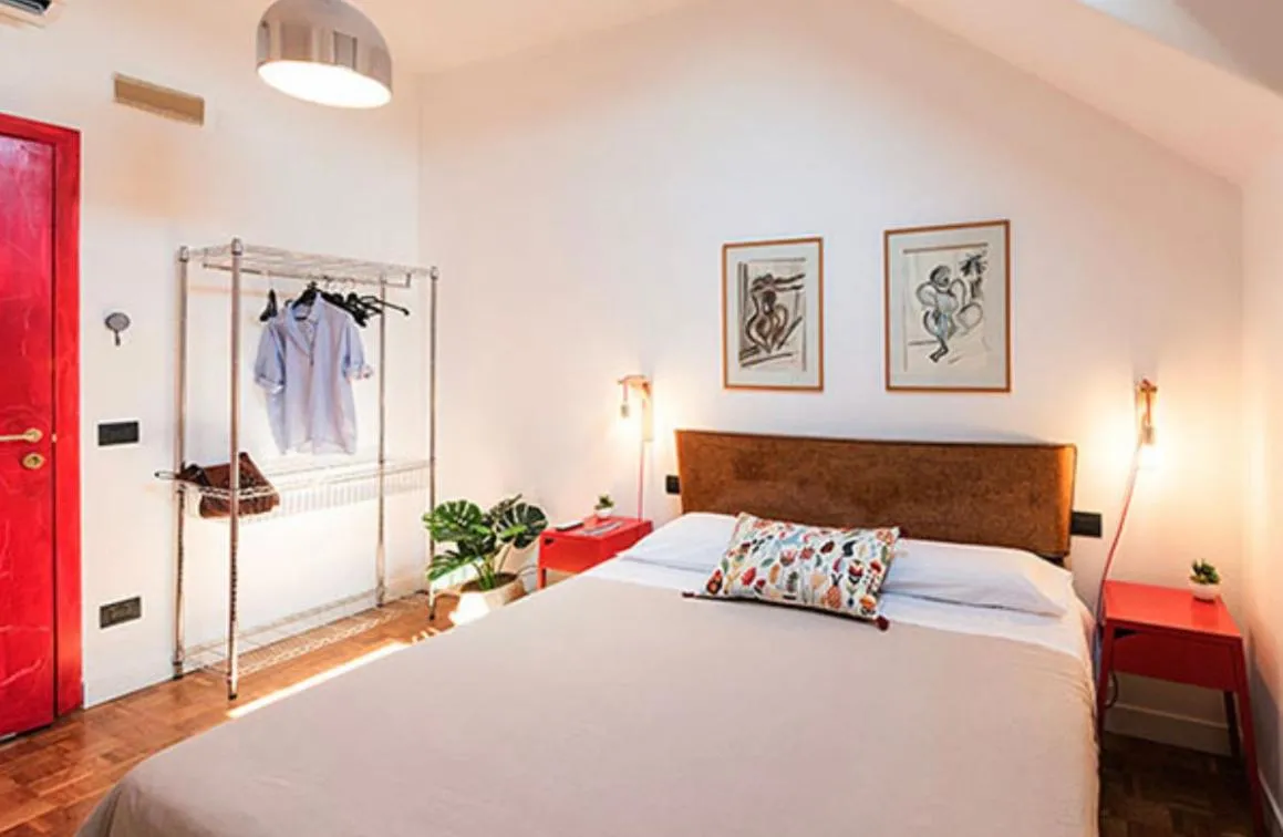 Bed in Mansarda Bellini 84