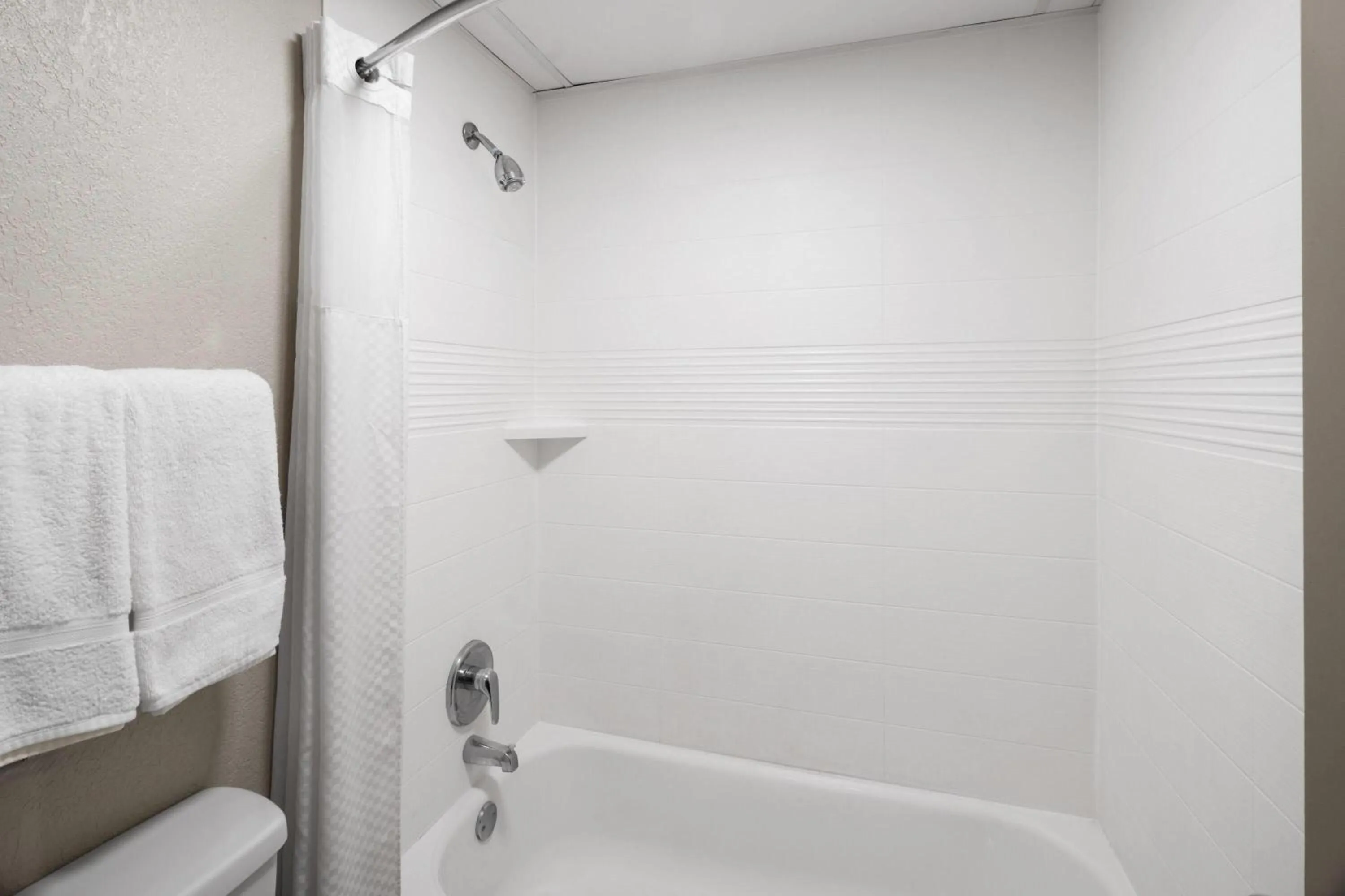 Bathroom in Days Inn by Wyndham Augusta Wheeler Road