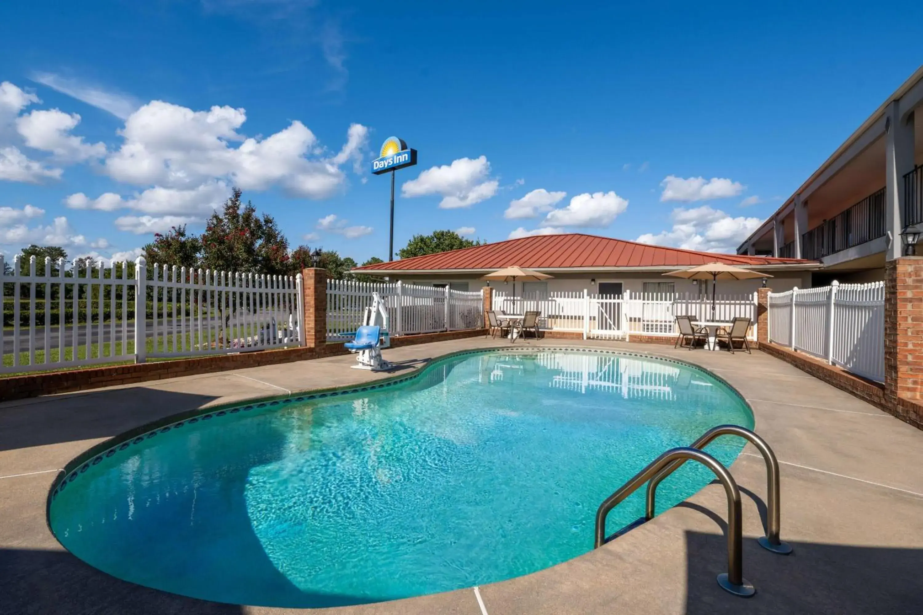 Swimming pool in Days Inn by Wyndham Augusta Wheeler Road Swimming pool in Days Inn by Wyndham Augusta Wheeler Road