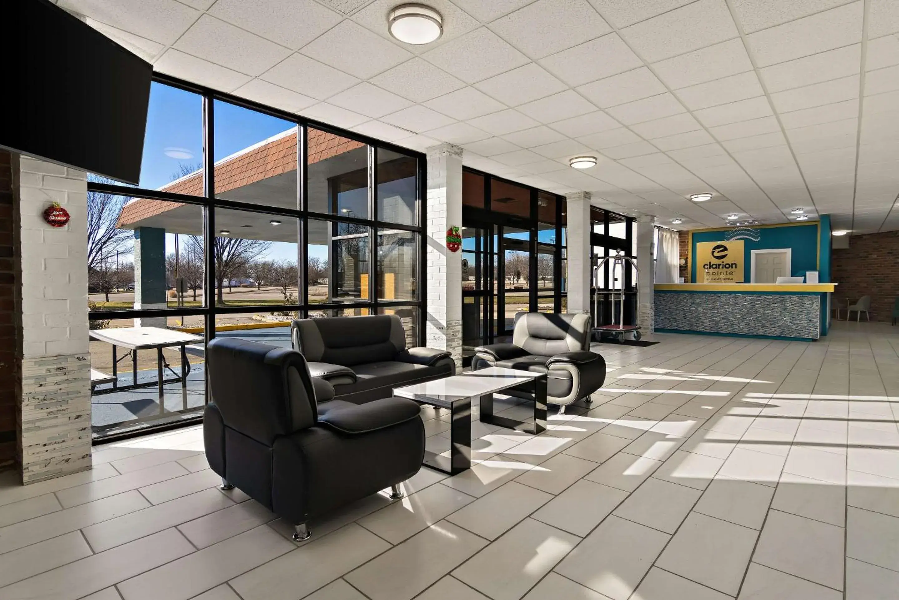 Lobby or reception in Clarion Pointe Bloomington-Normal near I-55 and University Lobby or reception in Clarion Pointe Bloomington-Normal near I-55 and University