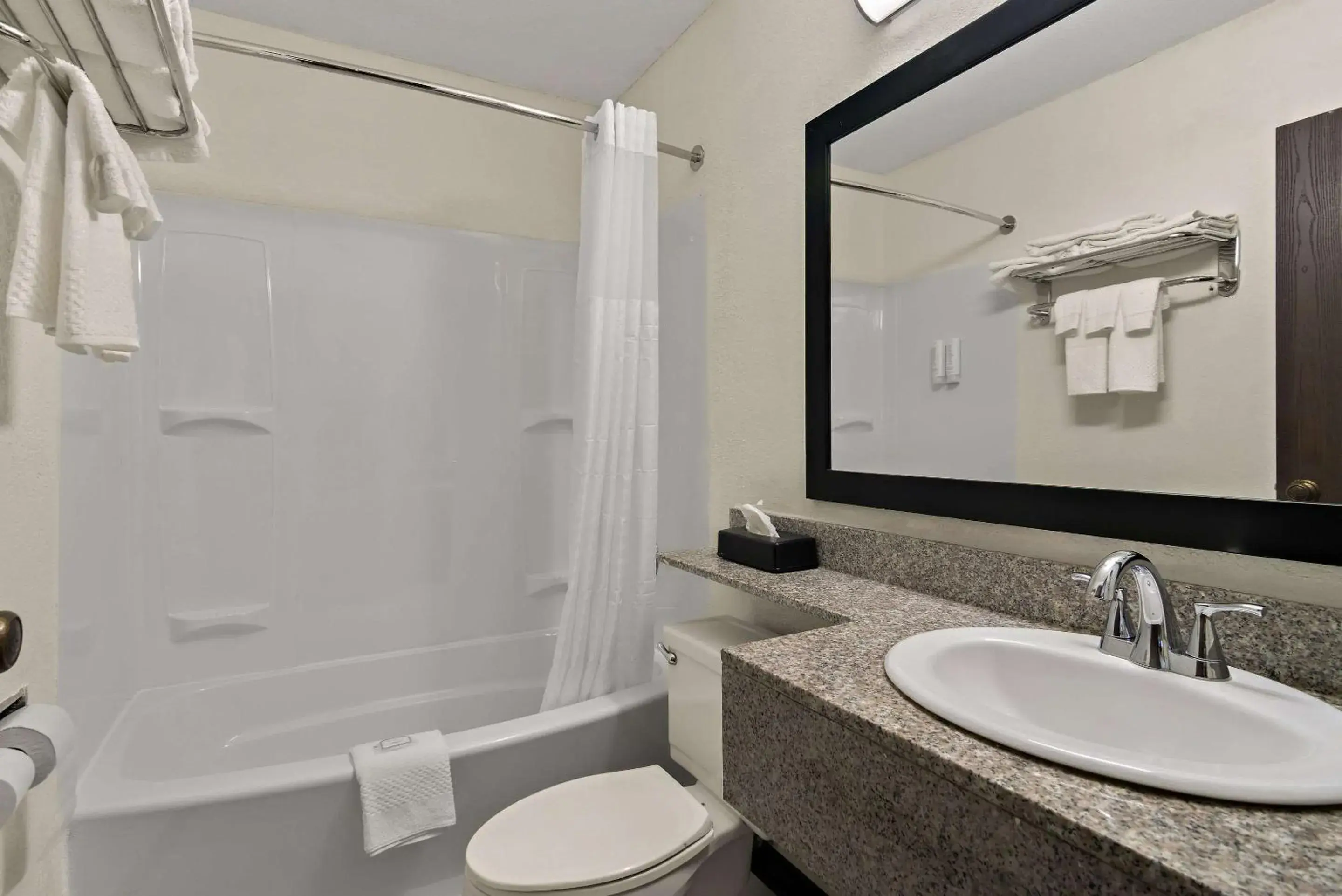 Bedroom in Clarion Pointe Bloomington-Normal near I-55 and University Bedroom in Clarion Pointe Bloomington-Normal near I-55 and University