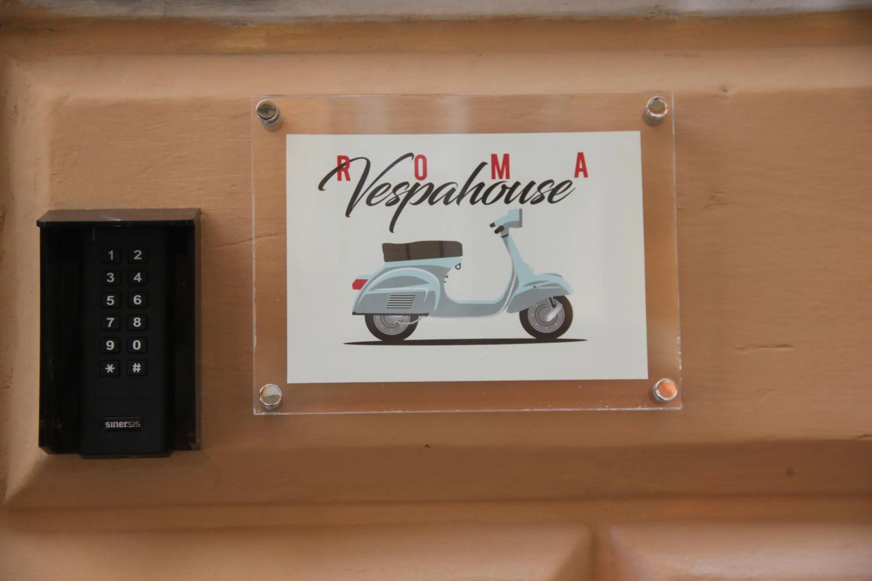 Property logo or sign in Roma Vespahouse