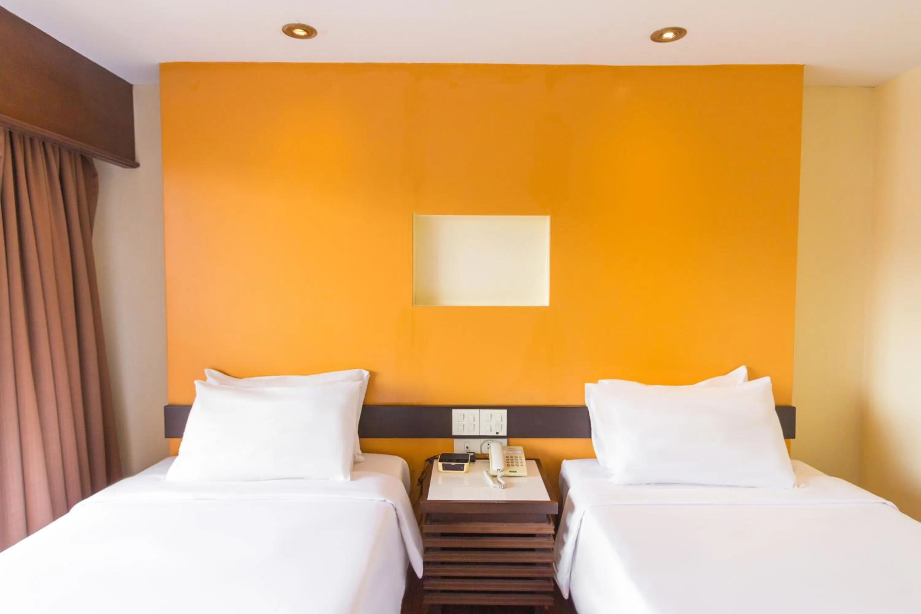 Bed in Mayflower Grande Chiang Mai