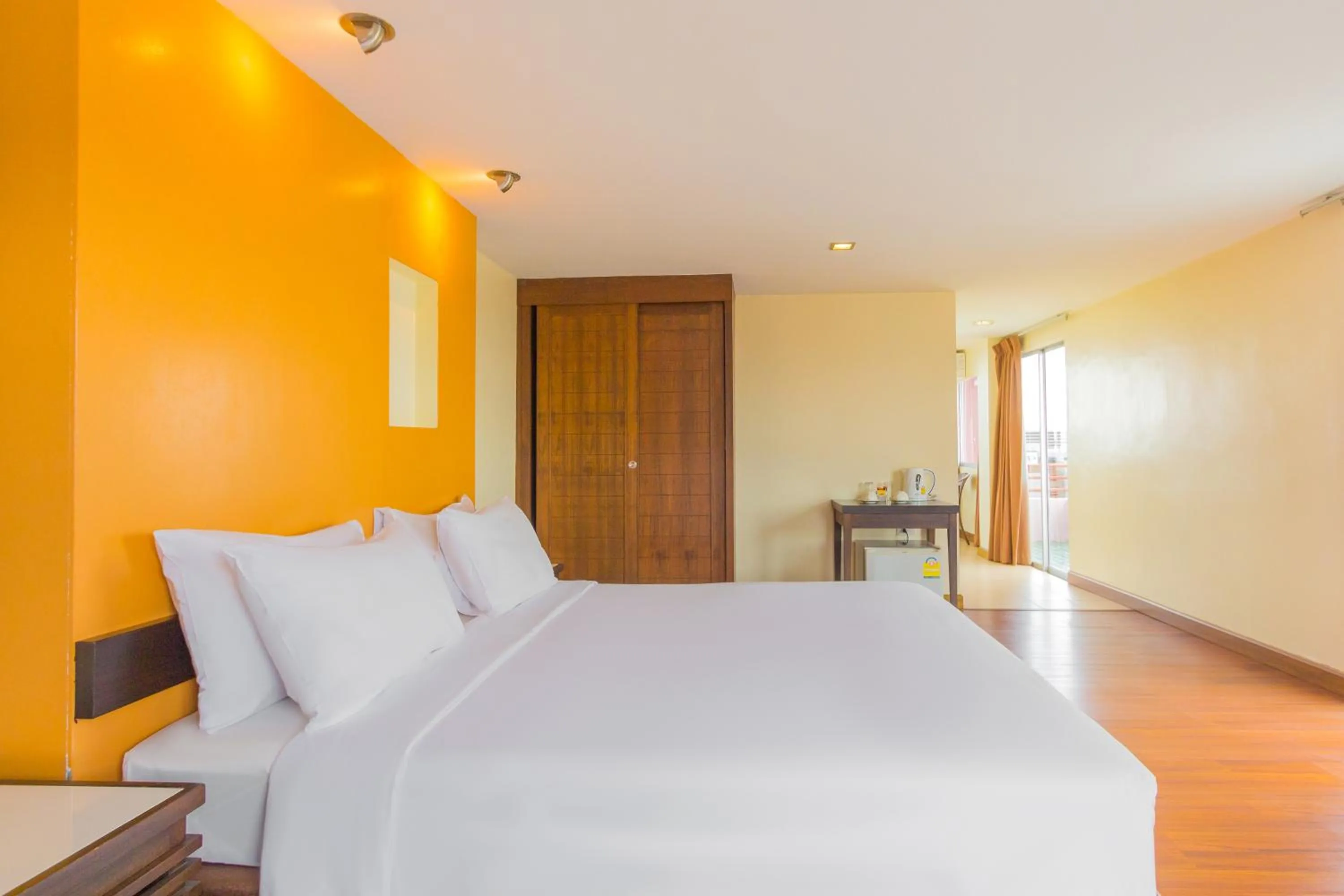 Bed in Mayflower Grande Chiang Mai