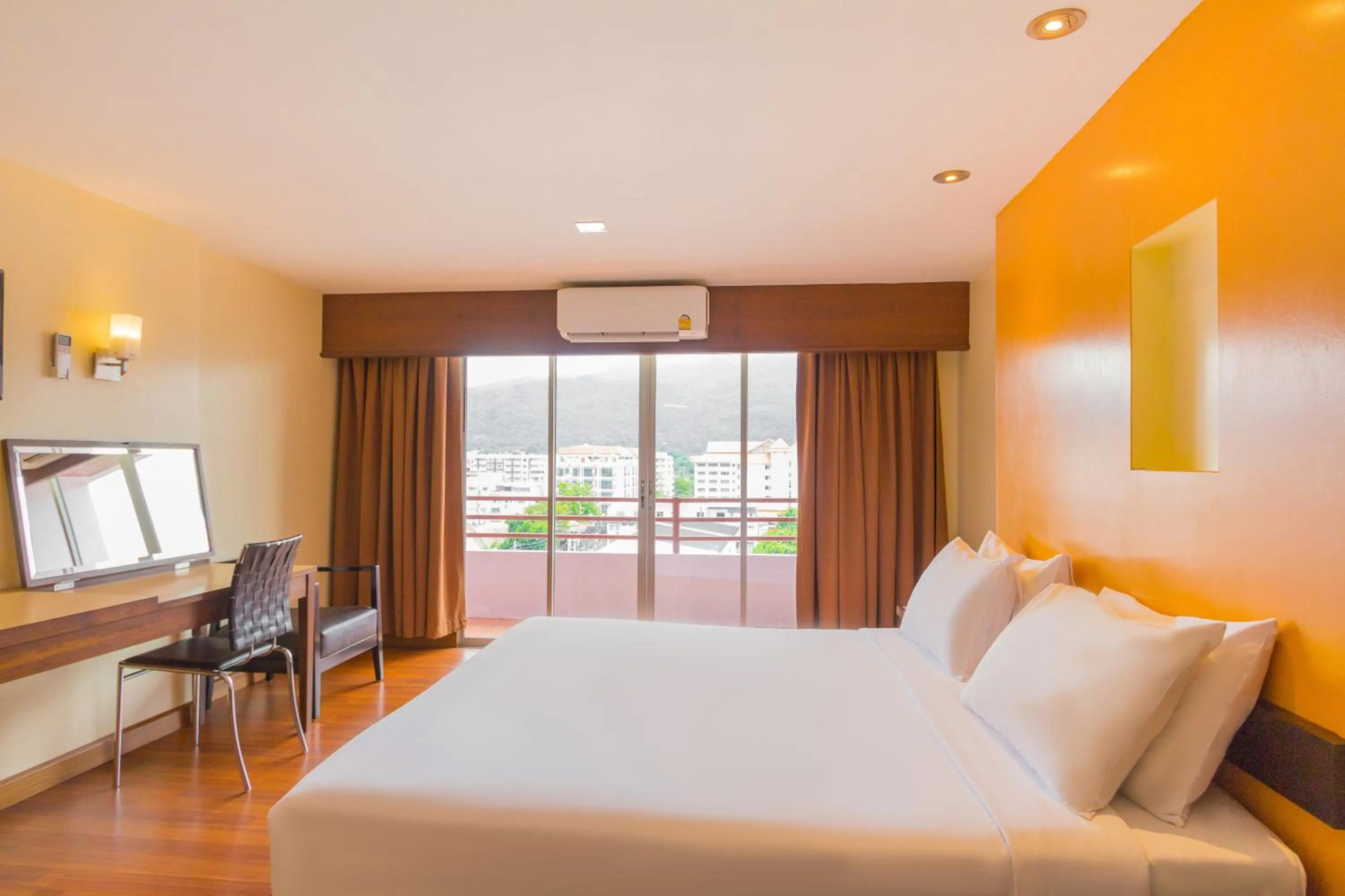 Bed in Mayflower Grande Chiang Mai