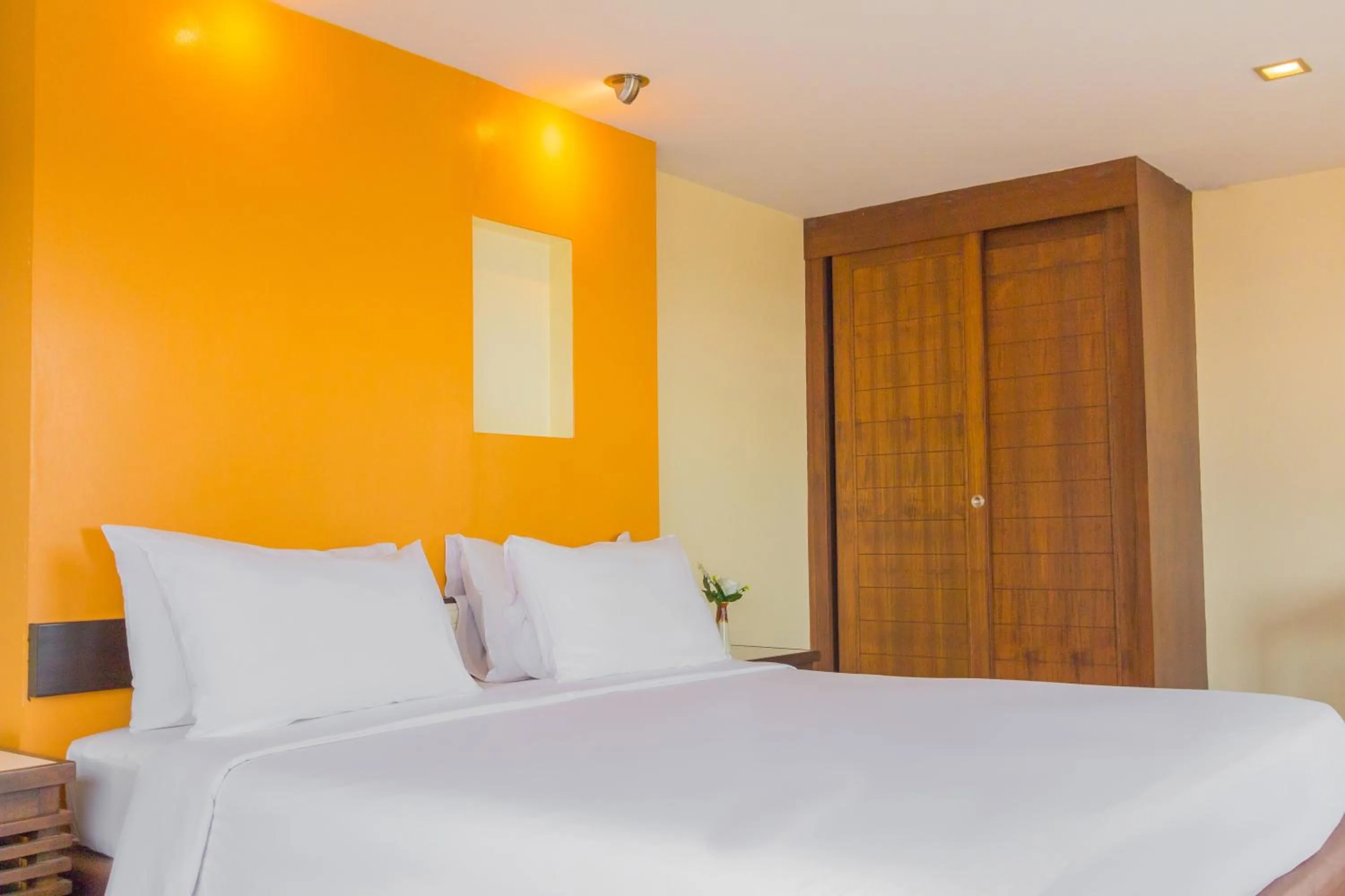 Bed in Mayflower Grande Chiang Mai