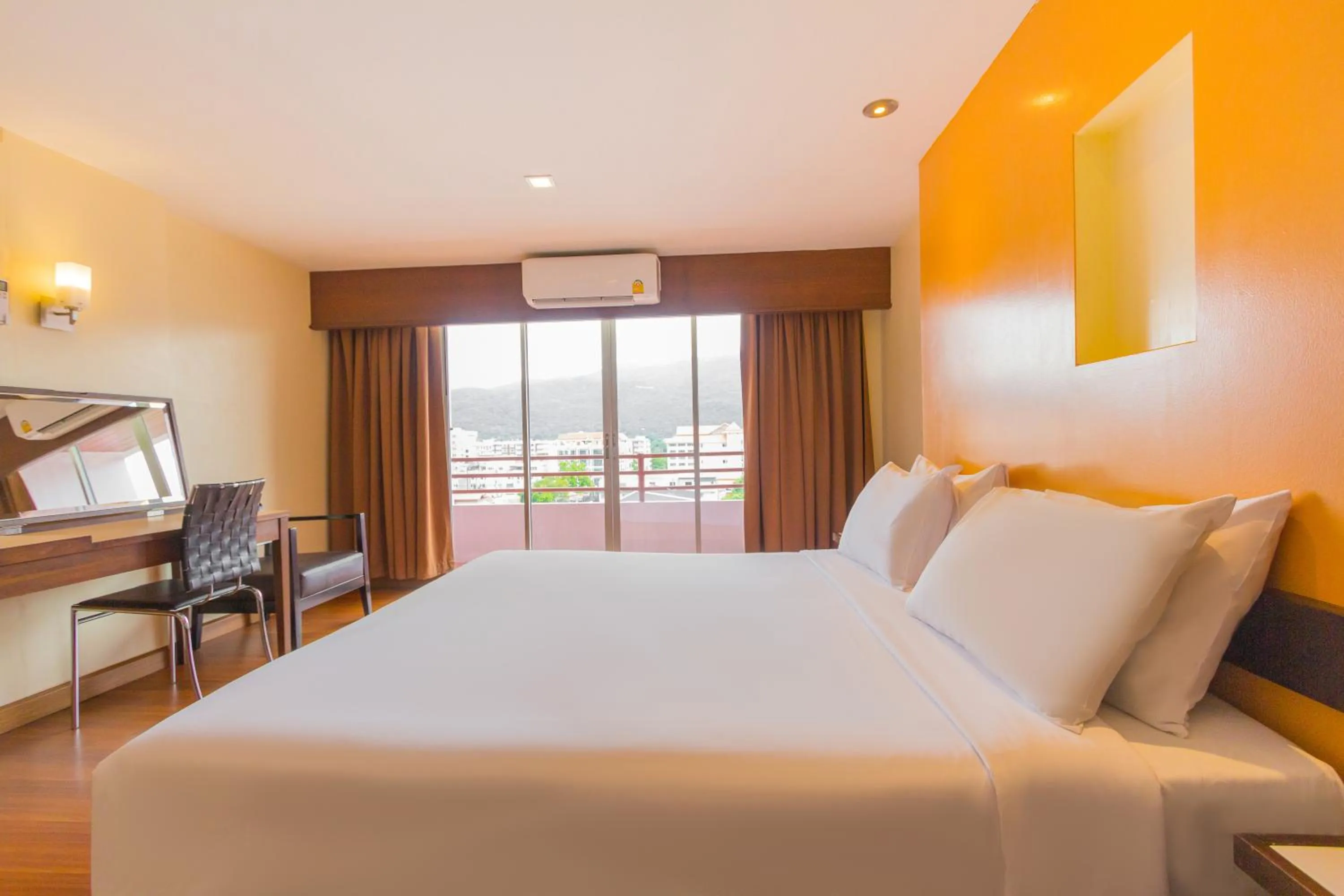 Bed in Mayflower Grande Chiang Mai