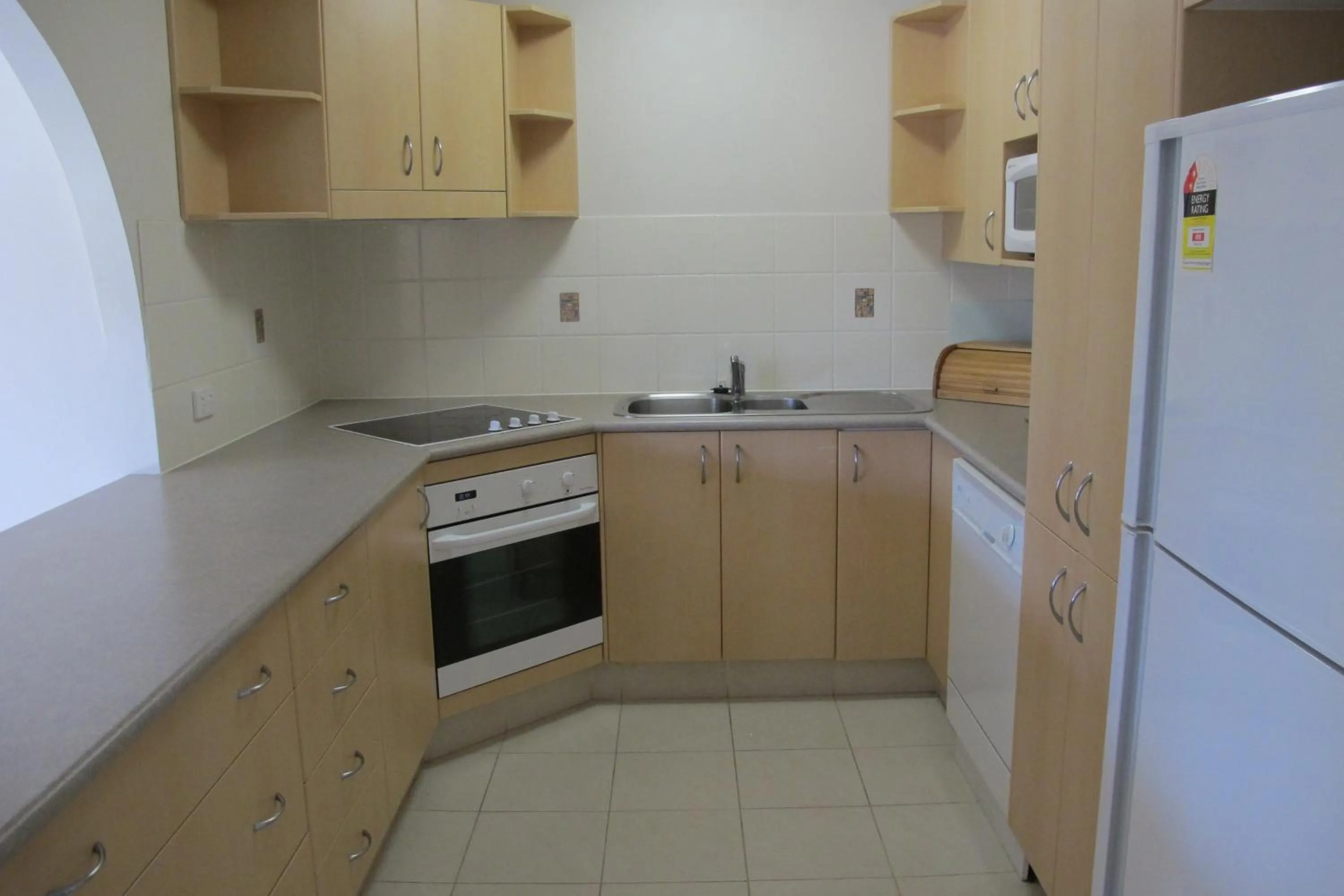 Kitchen or kitchenette in Grangewood Court Apartments