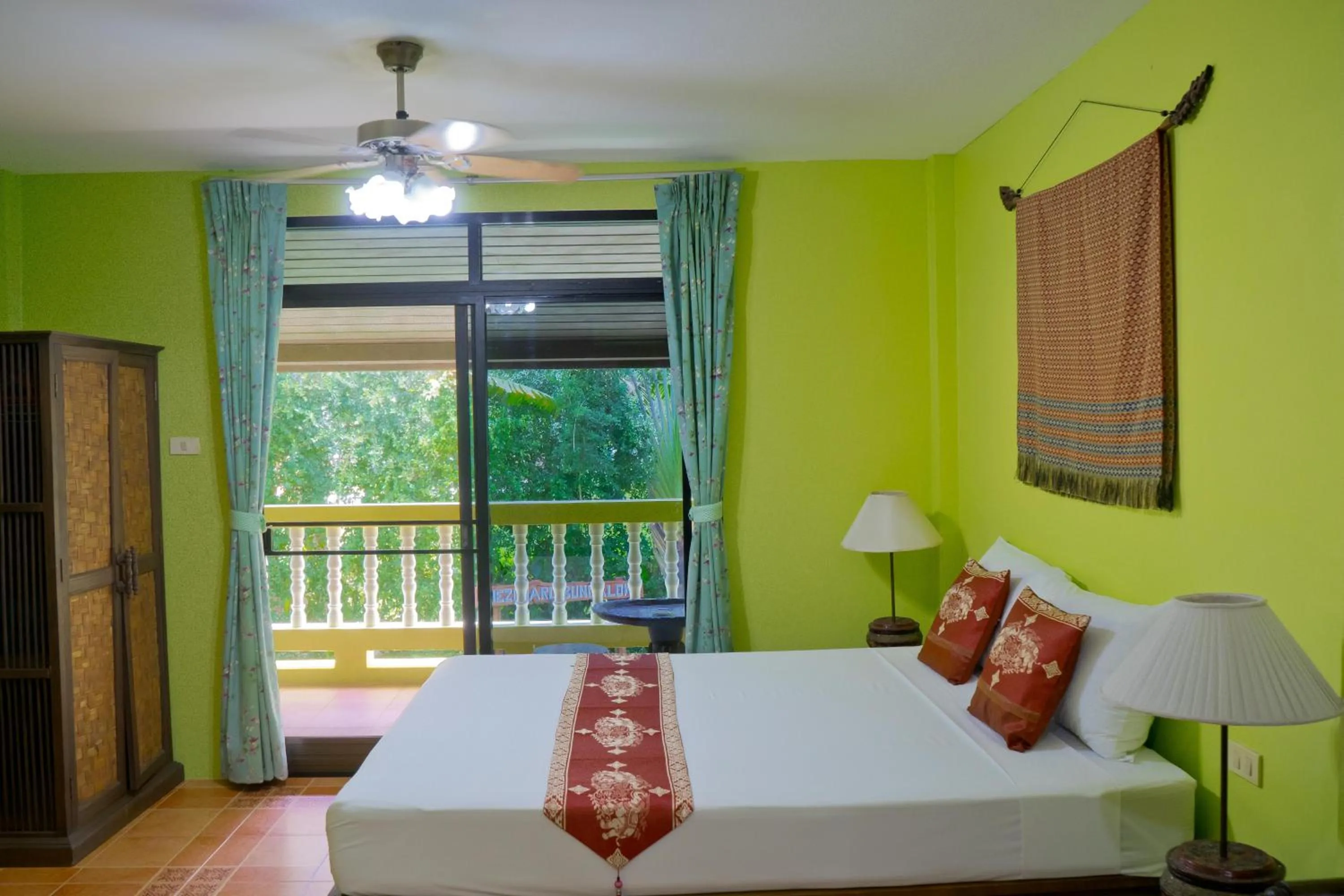 Bedroom, Bed in Chez Charly Bungalow