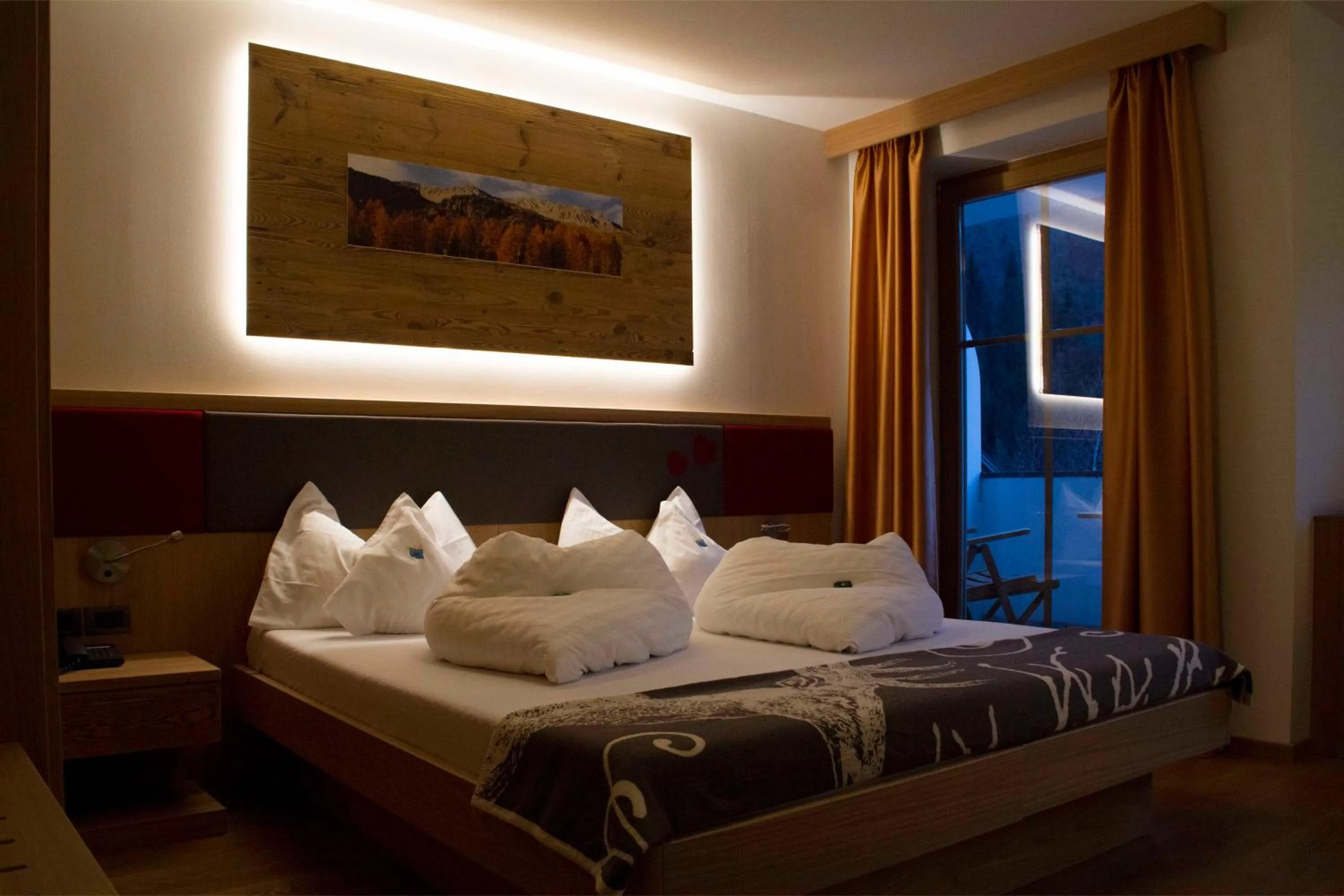 Bed in Berghotel Miramonti