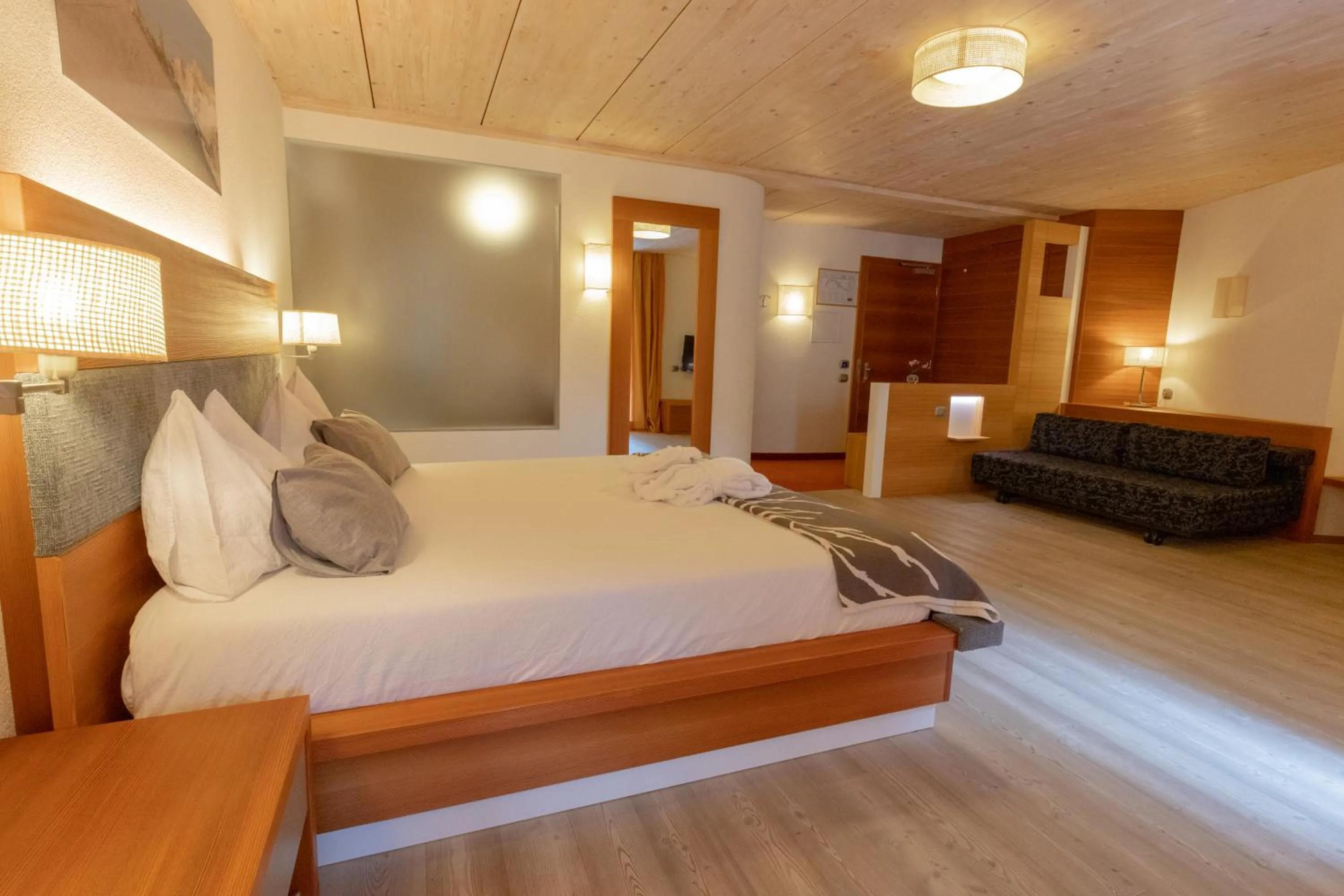 Bed in Berghotel Miramonti