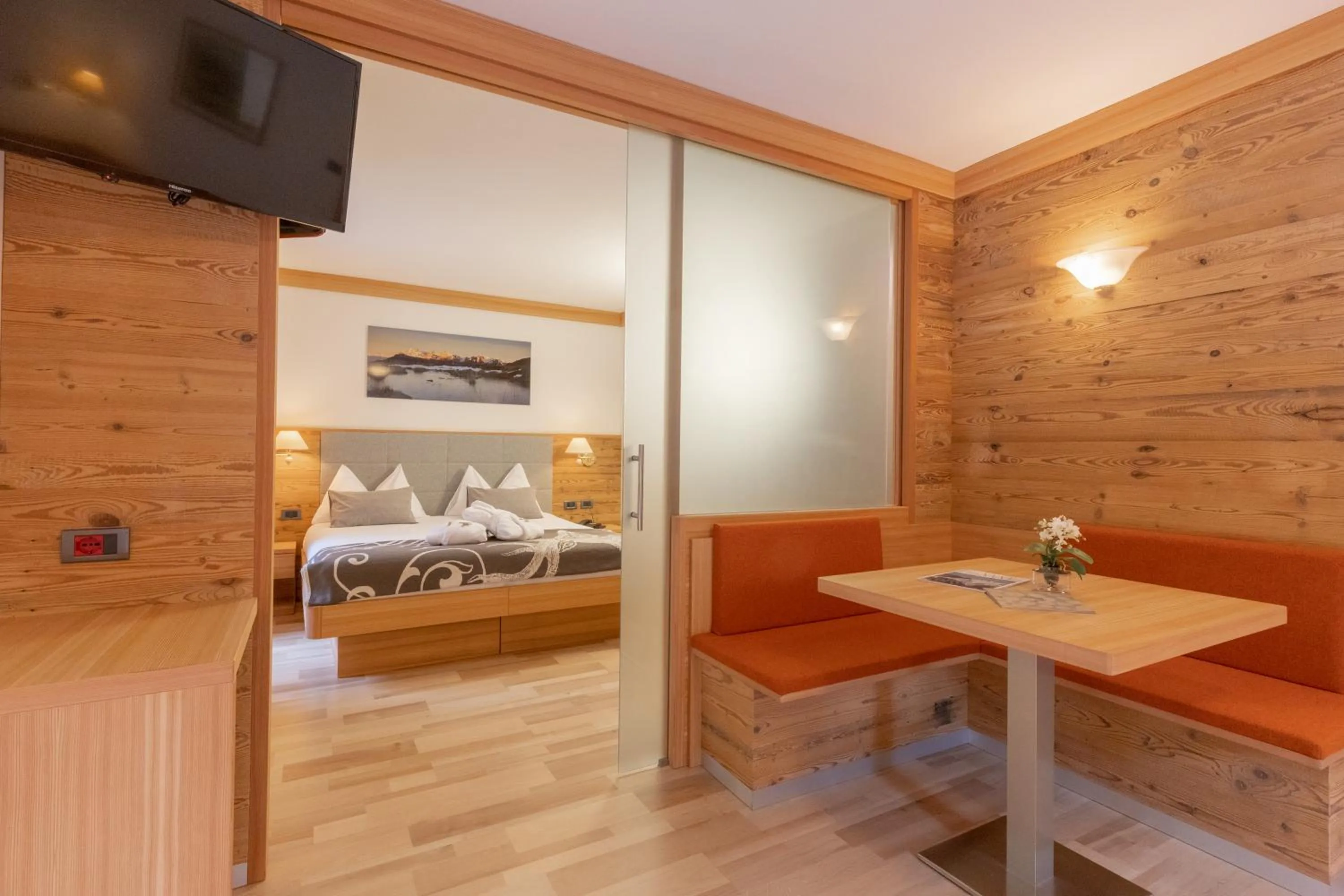 Bed in Berghotel Miramonti