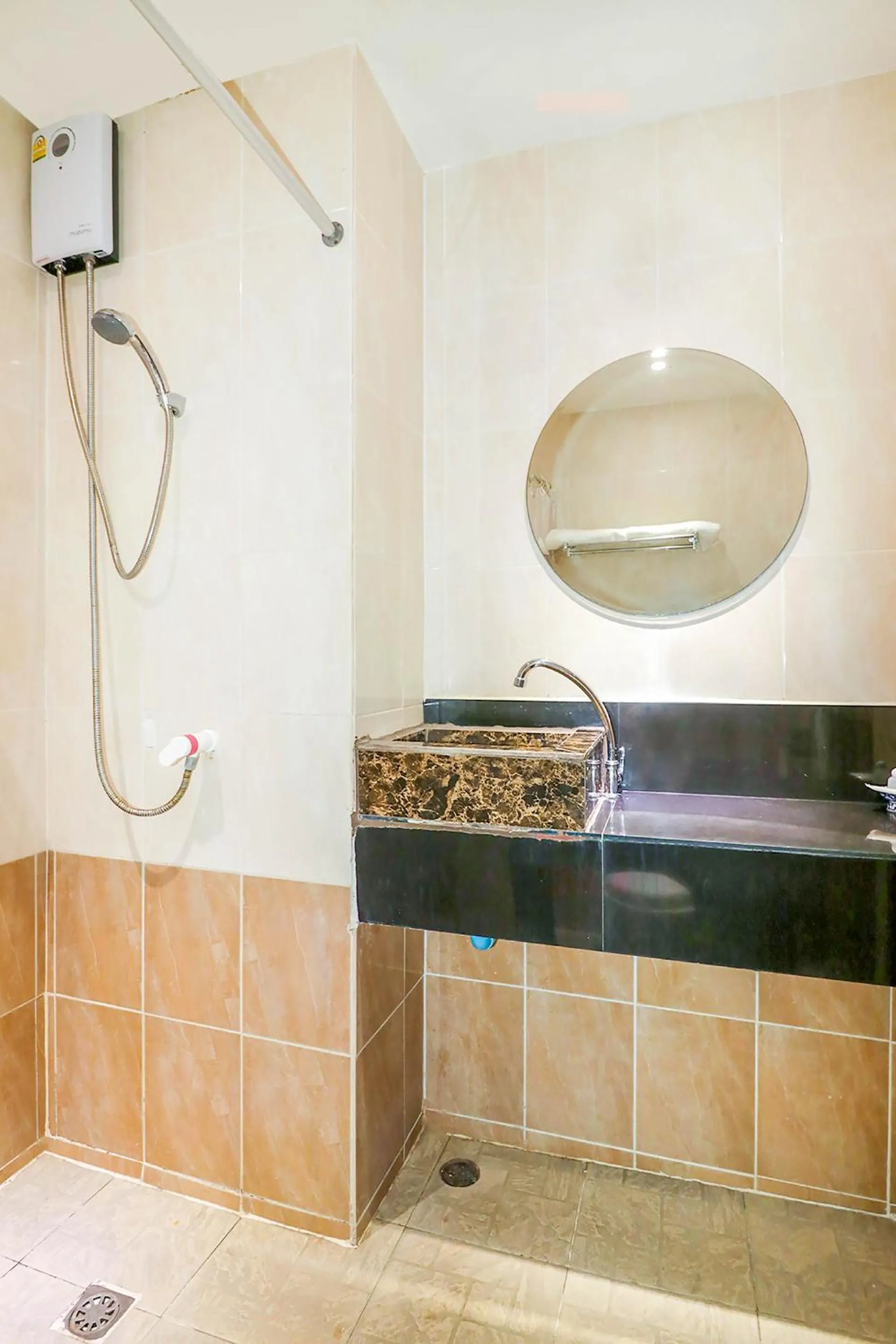 Bathroom in Natural Beach Hotel Pattaya