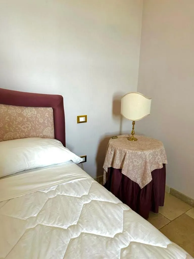 Bed in Hotel Saraceno Al Faro