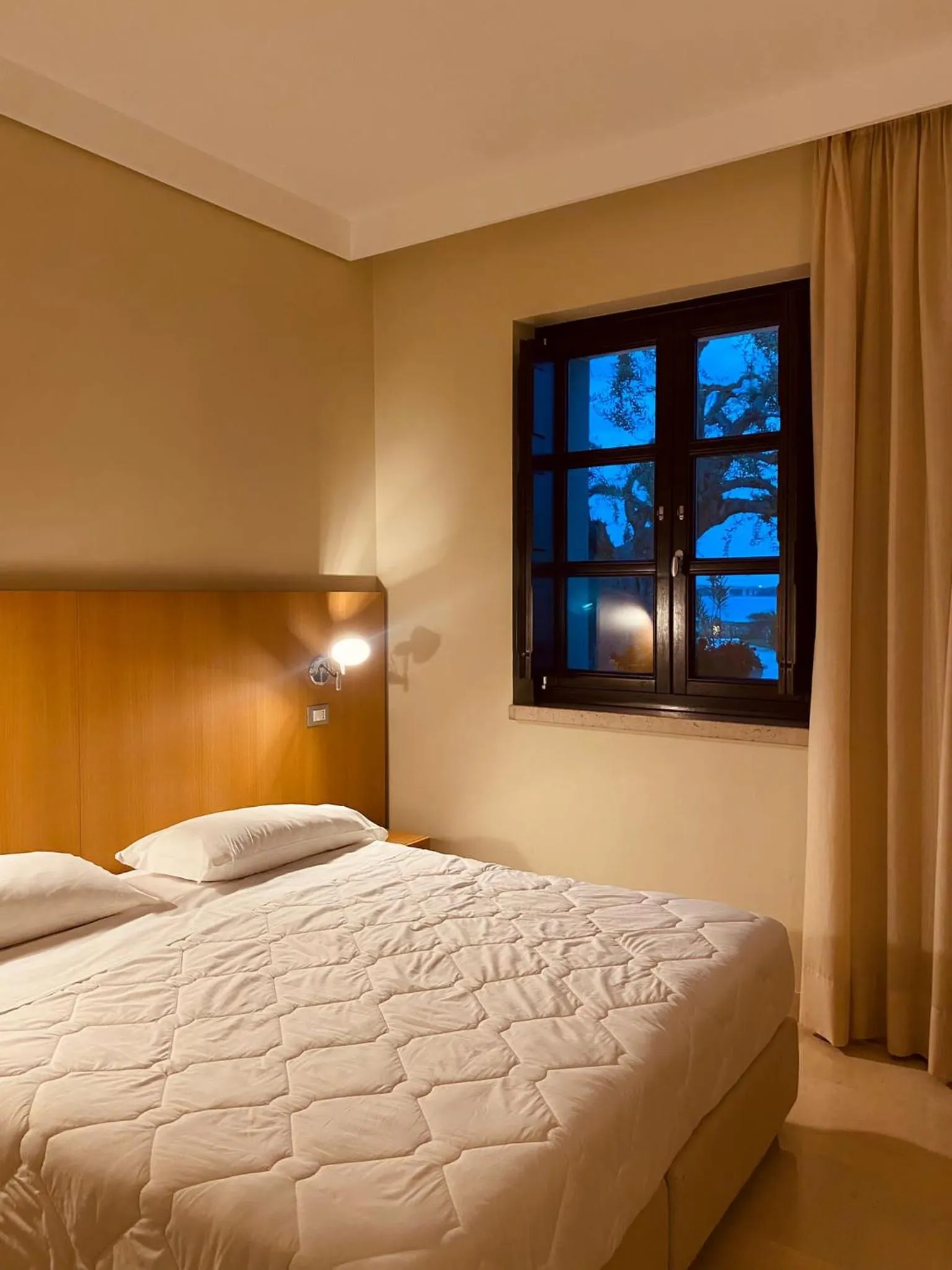 Bed in Hotel Saraceno Al Faro