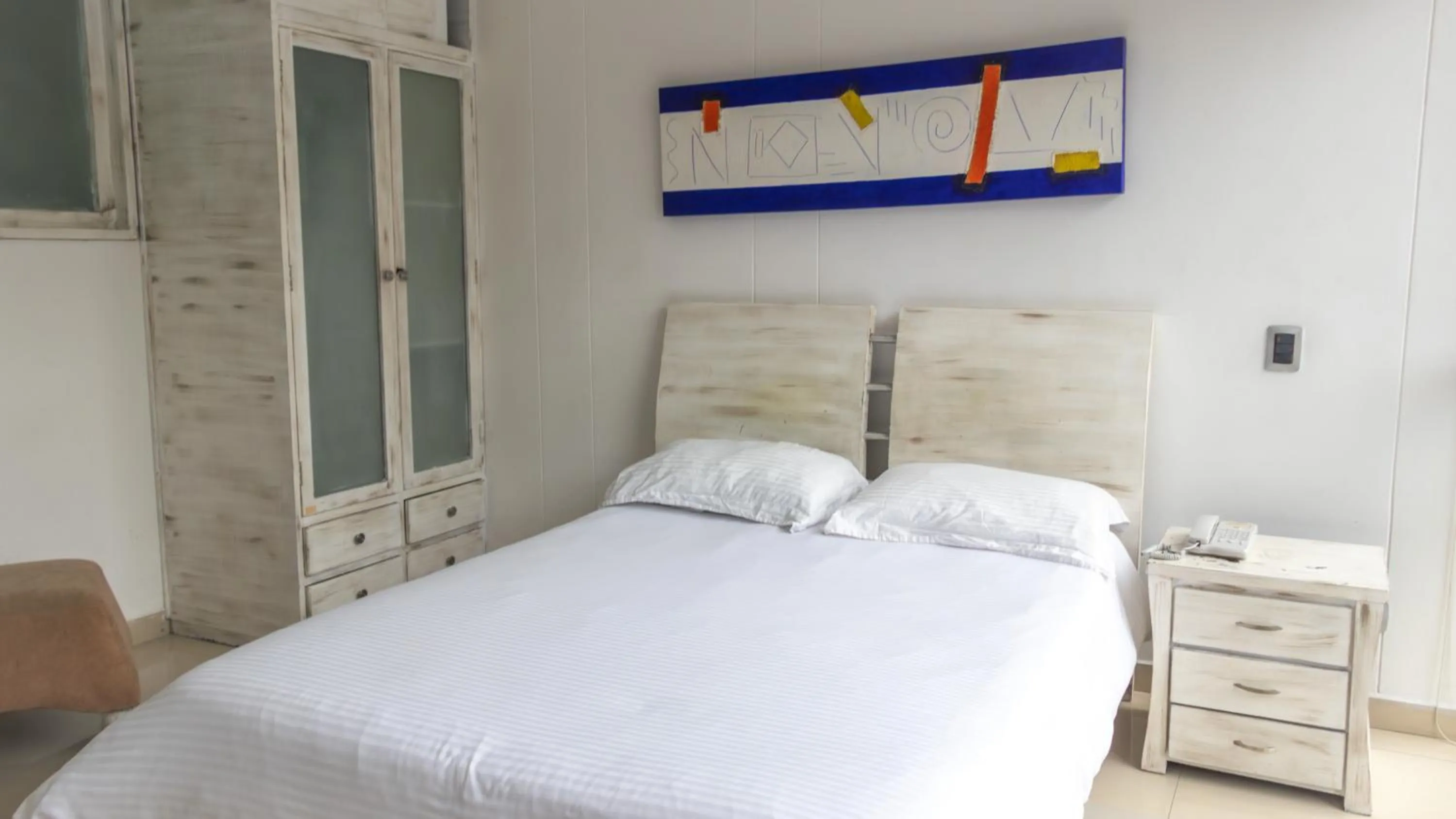 Bed in Monterosa Apartamentos Amoblados