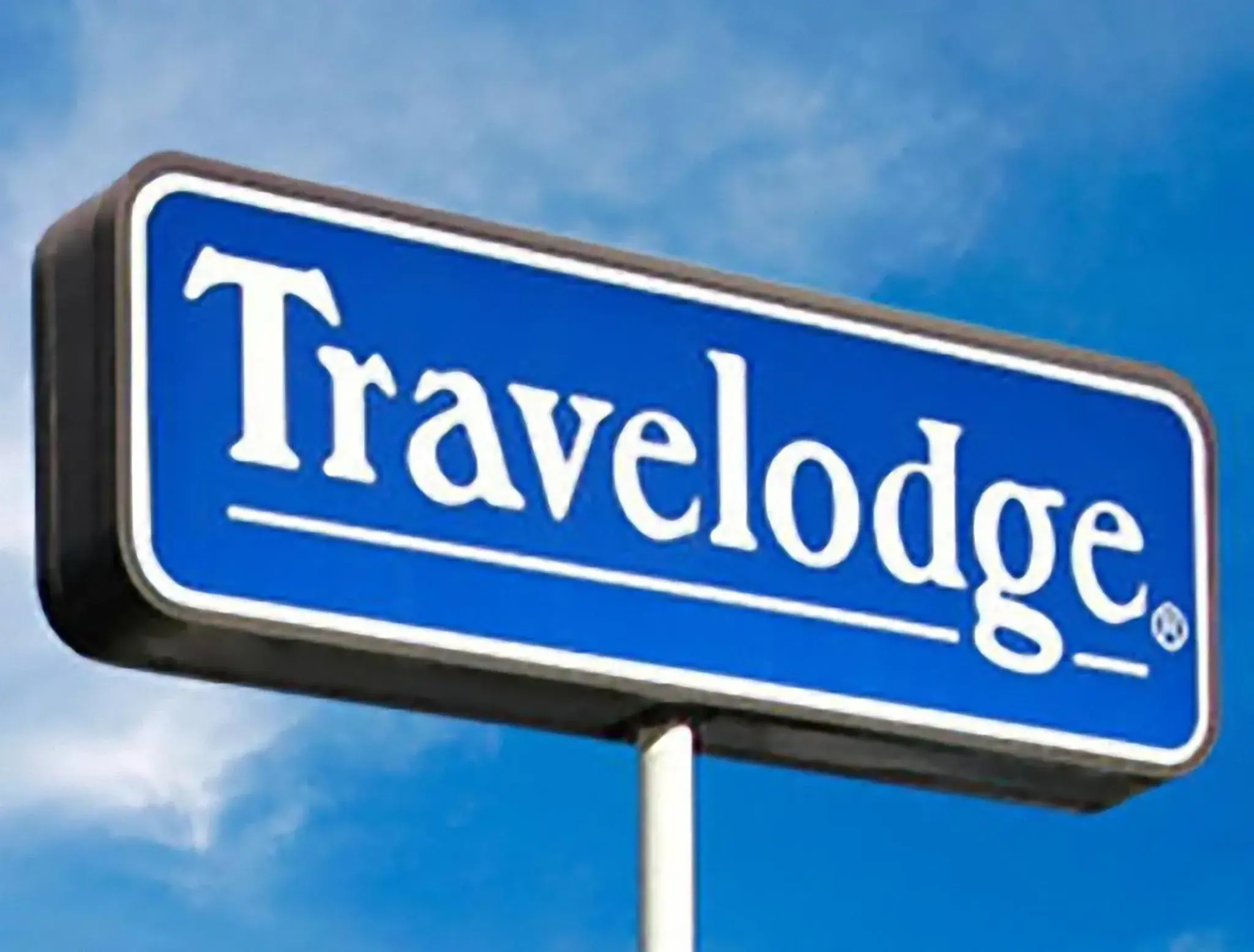 Property logo or sign in Travelodge by Wyndham Waukegan Gurnee