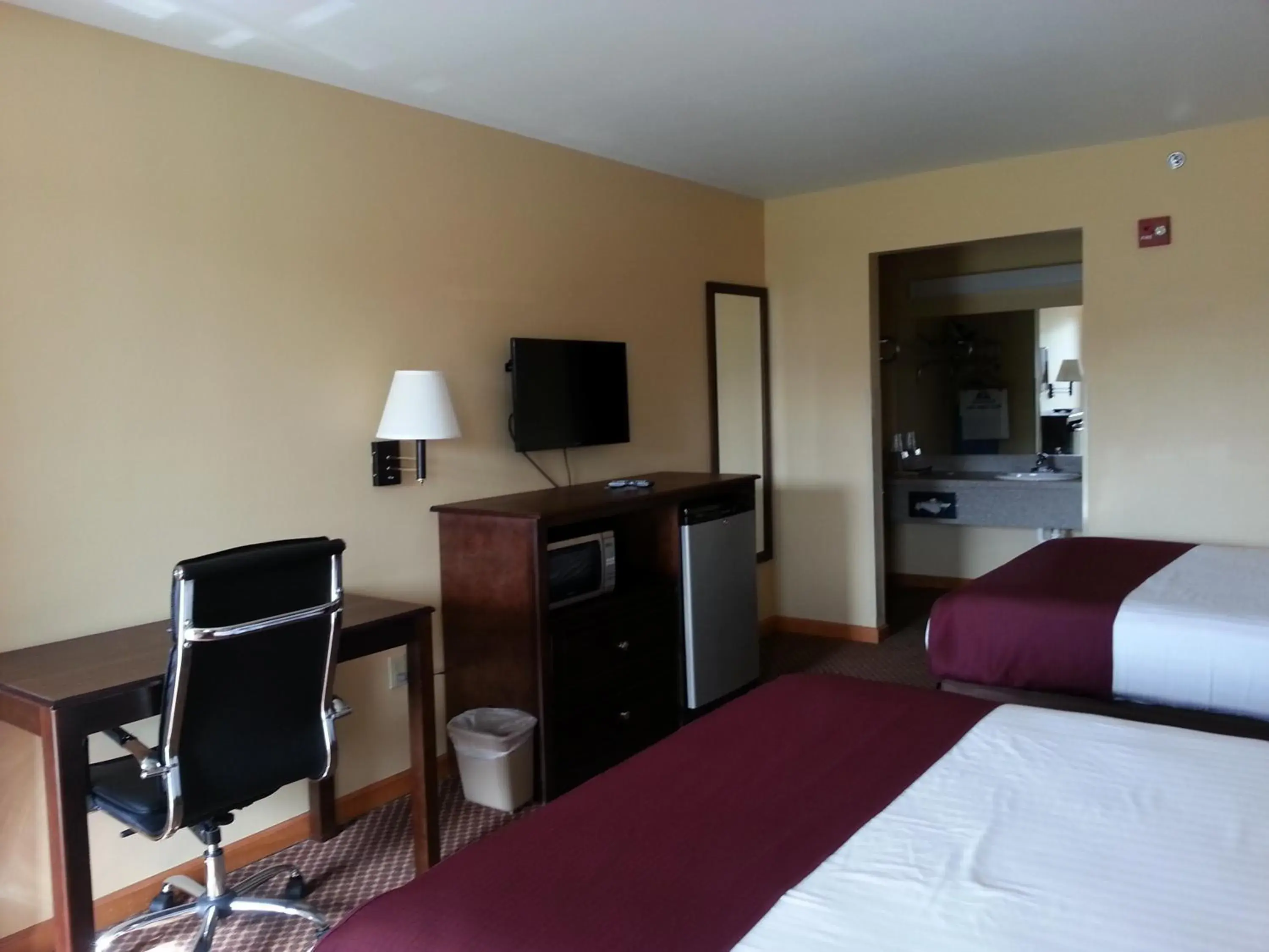 Bed in Americas Best Value Inn Bryant Bed in Americas Best Value Inn Bryant
