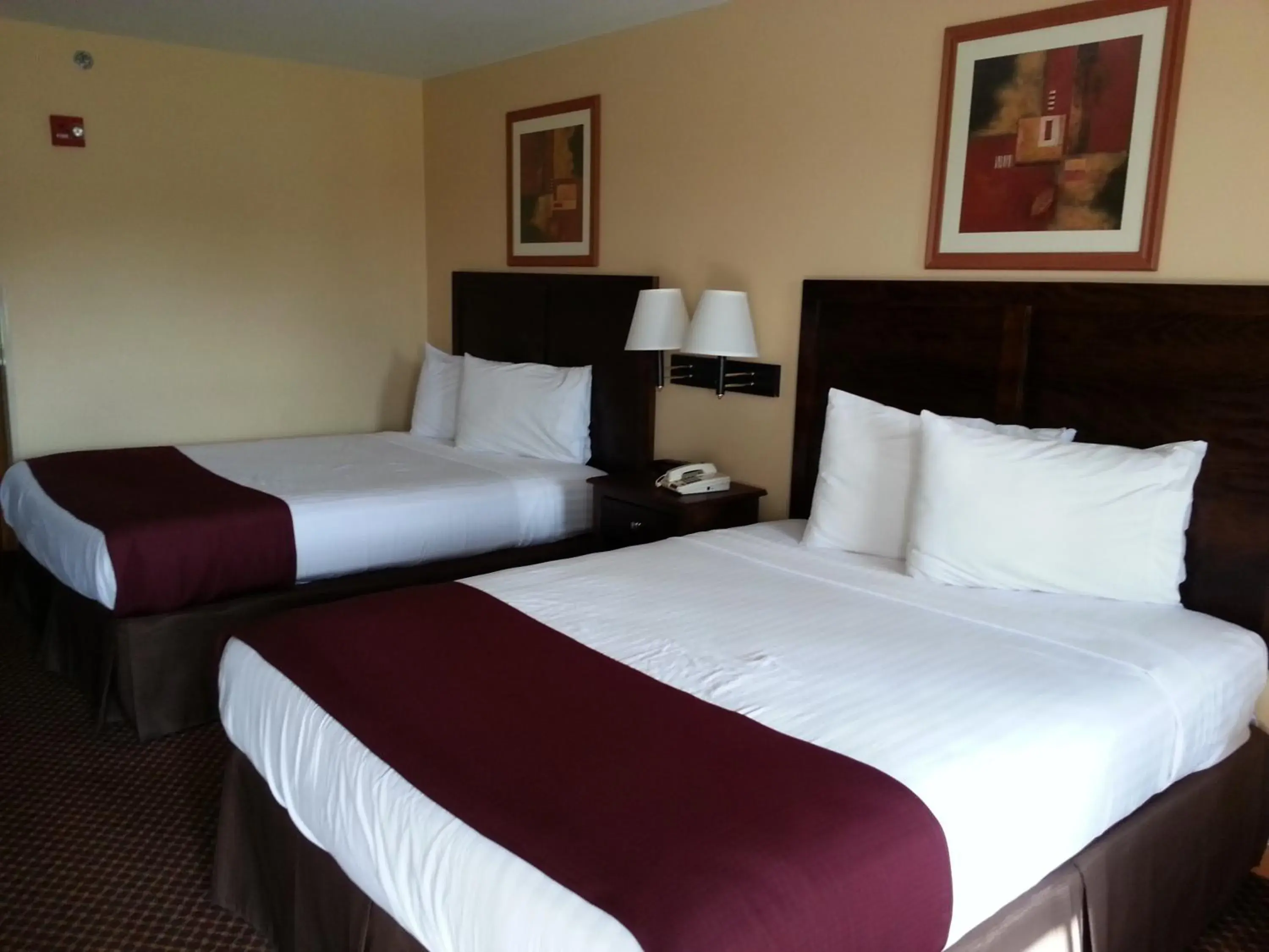 Bed in Americas Best Value Inn Bryant Bed in Americas Best Value Inn Bryant