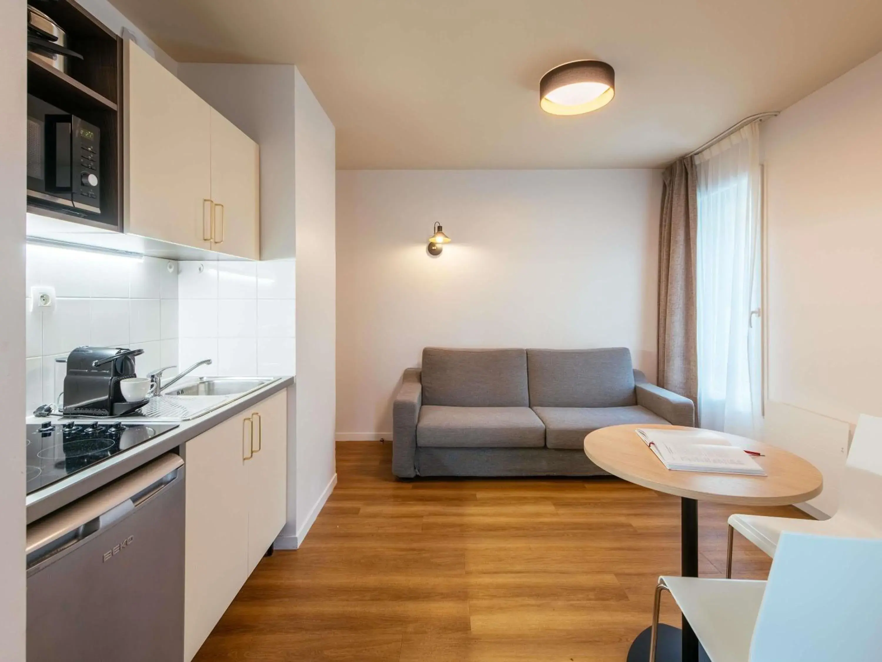 Bedroom in Aparthotel Adagio Access Paris Asnières Bedroom in Aparthotel Adagio Access Paris Asnières