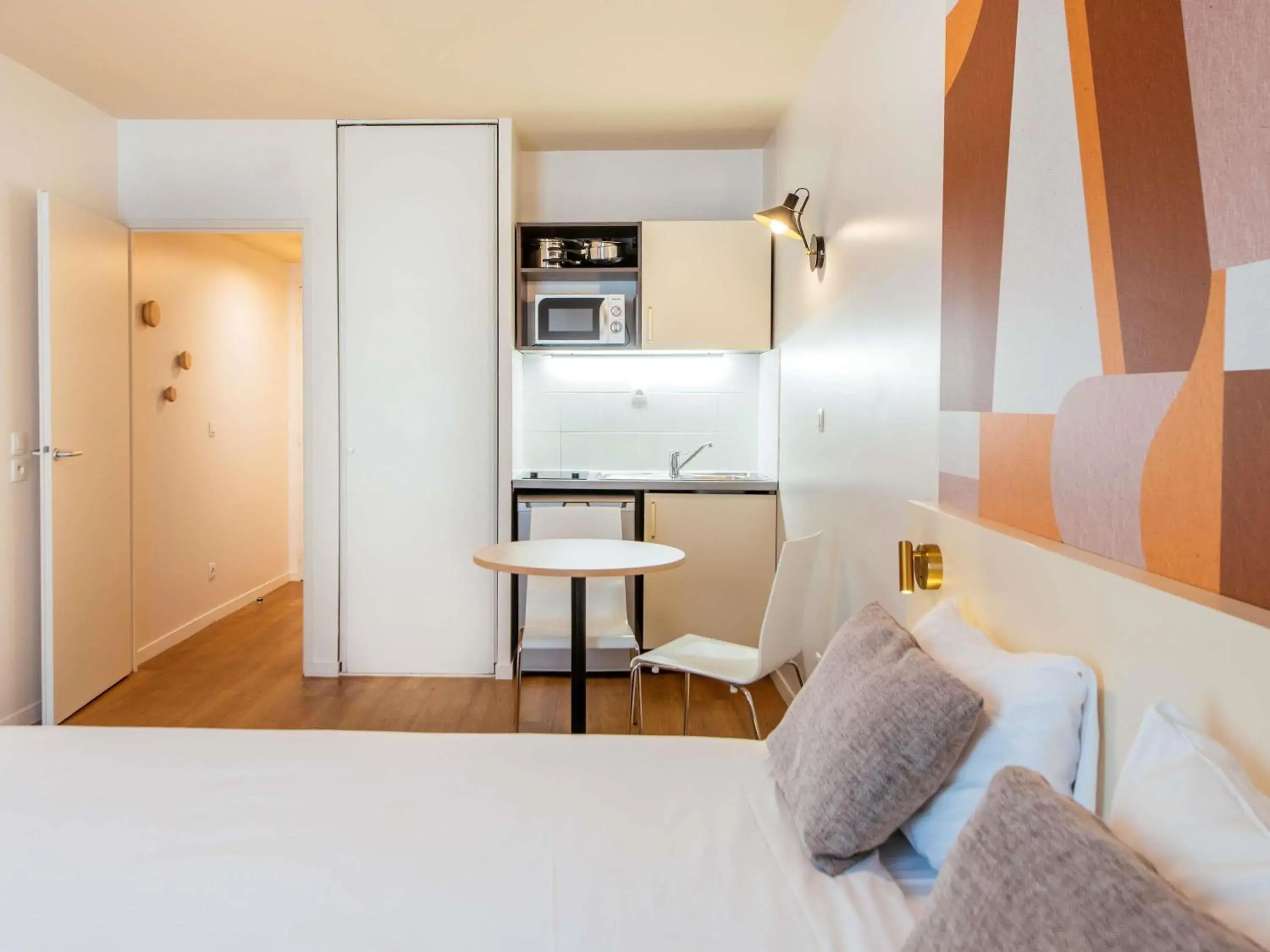 Bedroom, Bed in Aparthotel Adagio Access Paris Asnières Bedroom, Bed in Aparthotel Adagio Access Paris Asnières