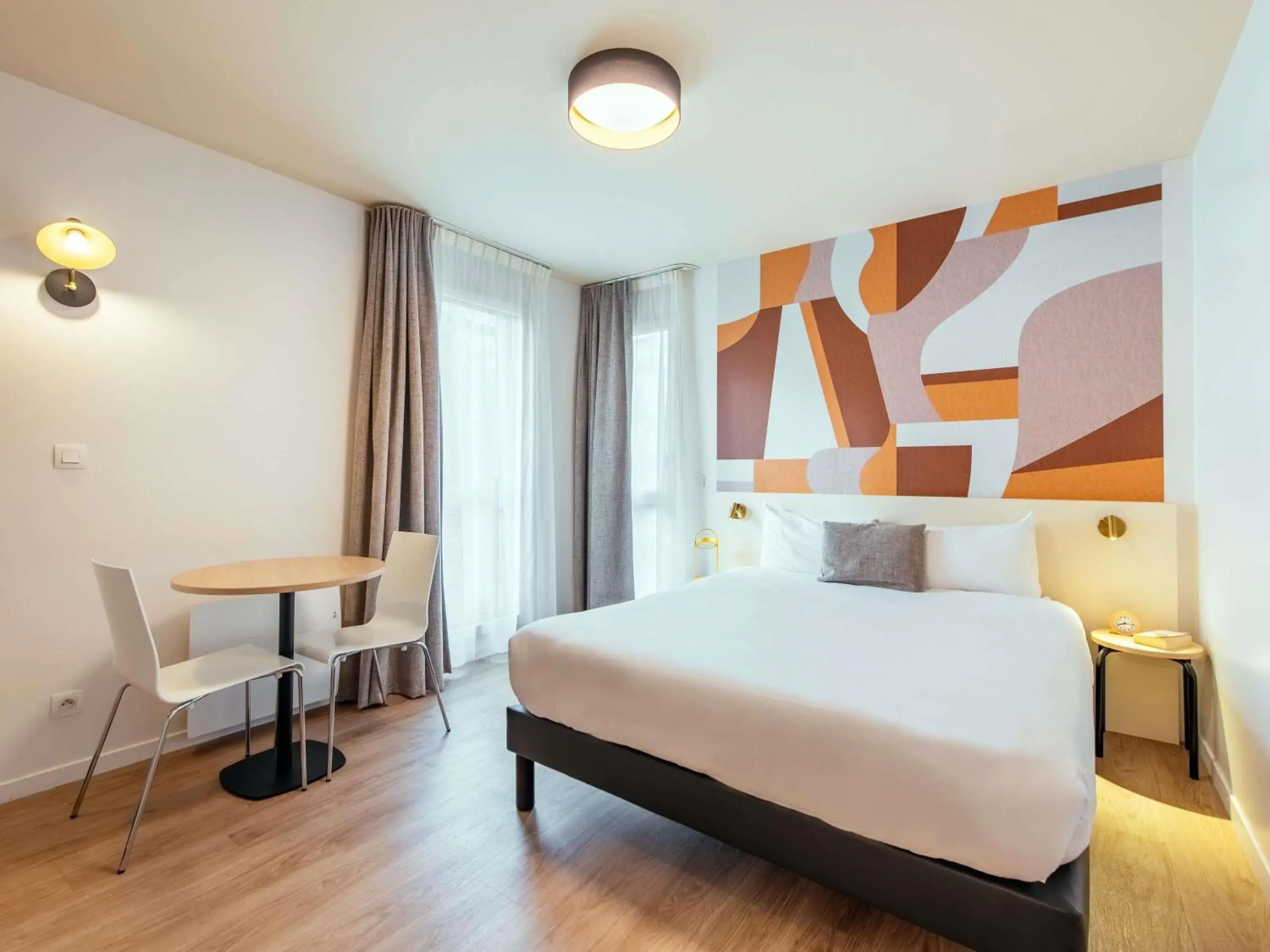 Bedroom, Bed in Aparthotel Adagio Access Paris Asnières Bedroom, Bed in Aparthotel Adagio Access Paris Asnières