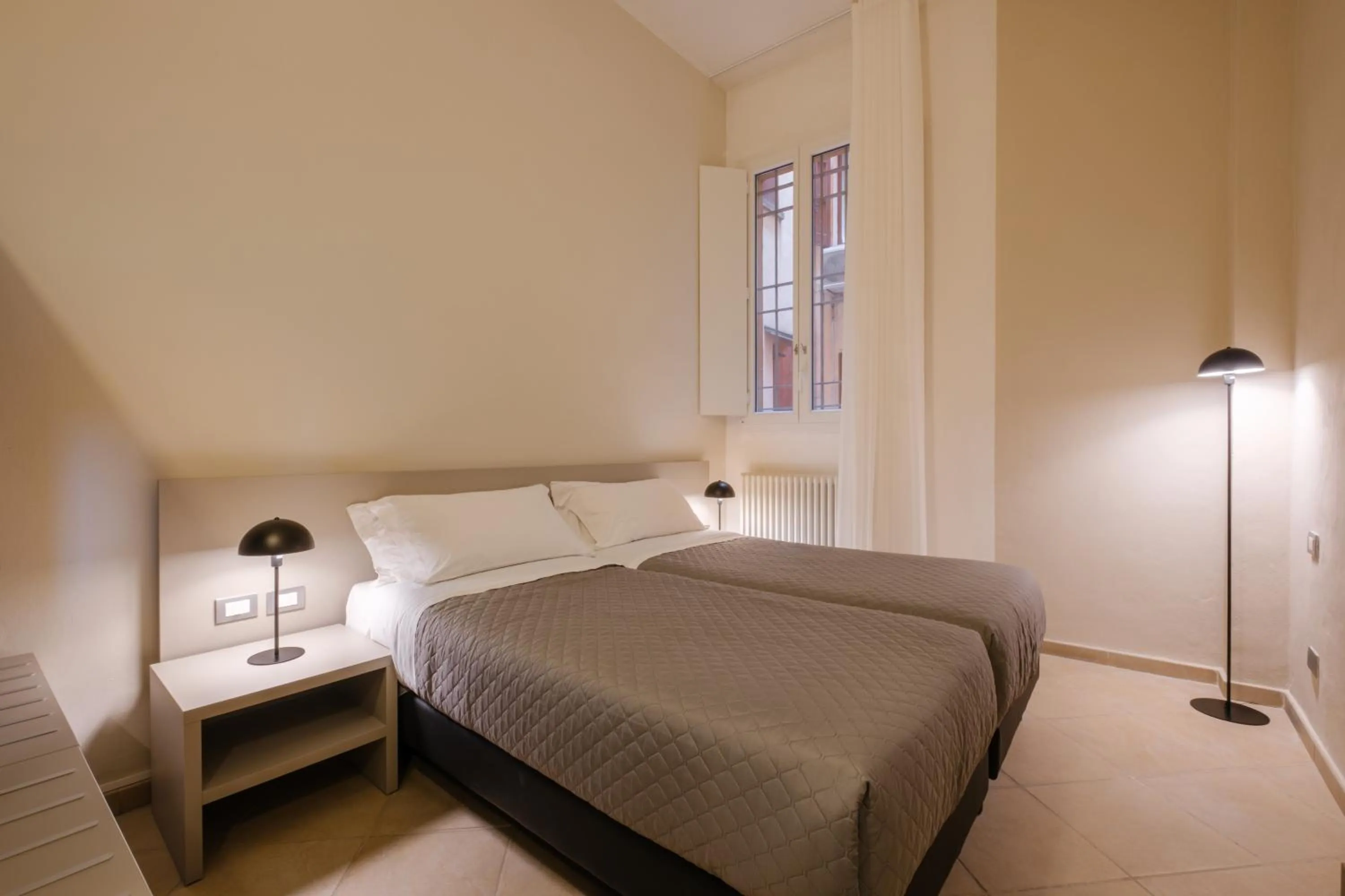 Bed in Residenza Ariosto by Studio Vita